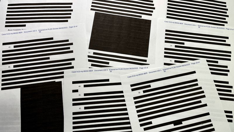 Pages of entirely redacted information are seen in an affidavit that was submitted to support the execution of a search warrant at former President Donald Trump's Mar-a-Lago estate in West Palm Beach, Fla., Aug. 26. A federal judge on Thursday appeared sympathetic to Trump's request to appoint a special master to review the documents the FBI seized from his home in August.