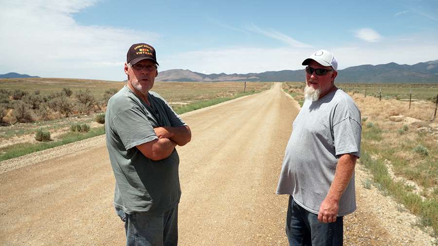 Neighbors Russell Meadows, left, and Dustin Cooney, right, are concerned by milk dumping happening near their homes in Greenville, a small community in Beaver County.
