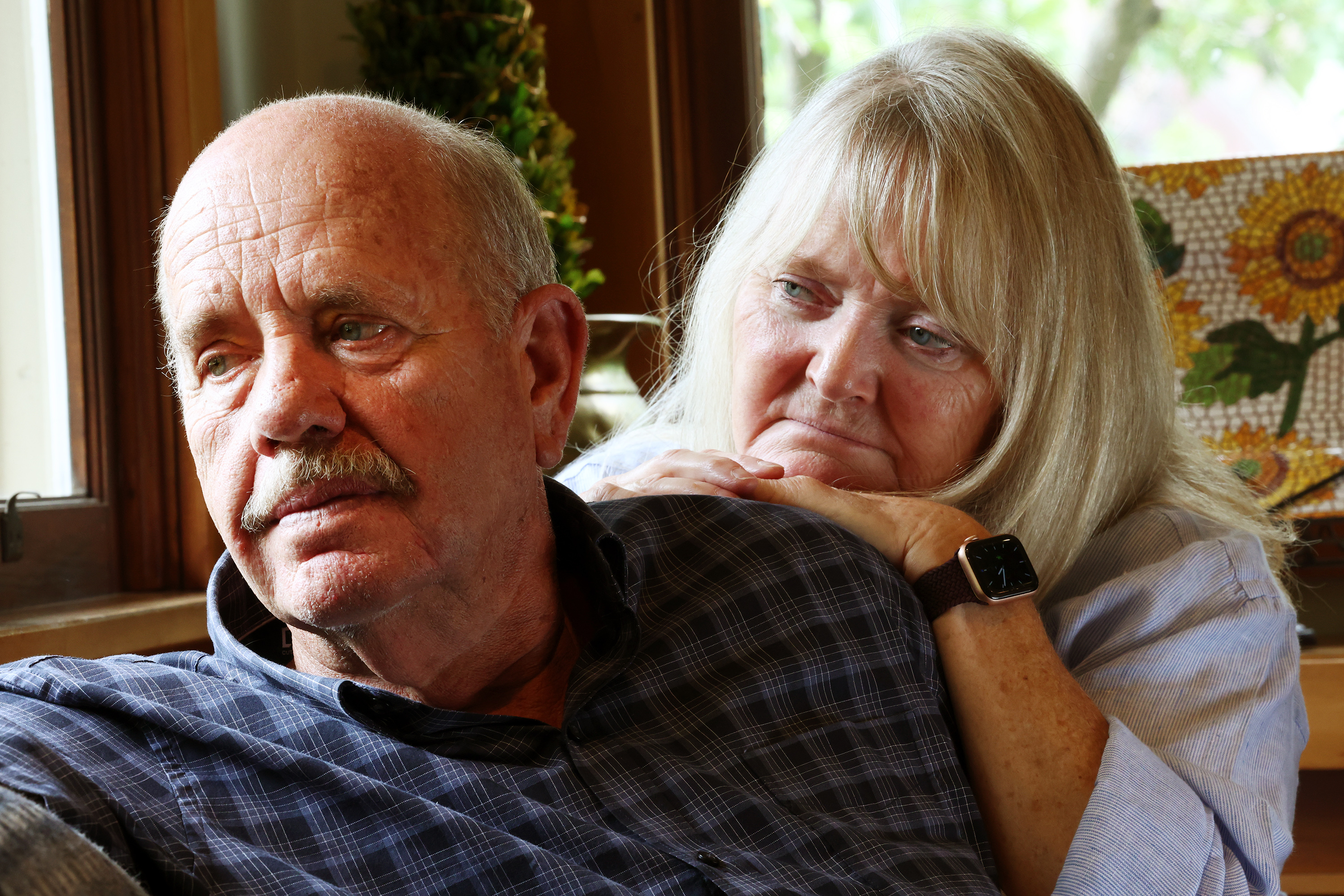 Ron and Sy Snarr, of Salt Lake City, pose for a photo on Friday, Aug. 19, after reading a letter from Jorge Benvenuto, who murdered their son, Zachary Snarr, in August 1996.