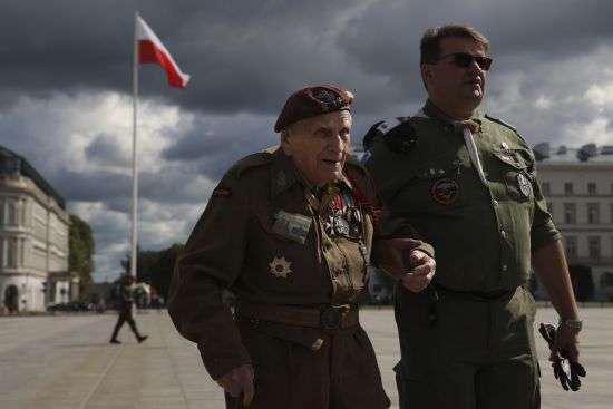 A Polish Army veteran attends a wreath laying ceremony marking the national World War II anniversary celebrations in Warsaw, Poland, Thursday. World War II began on September 1, 1939, with Nazi Germany's bombing and invasion of Poland, over five years of brutal occupation.
