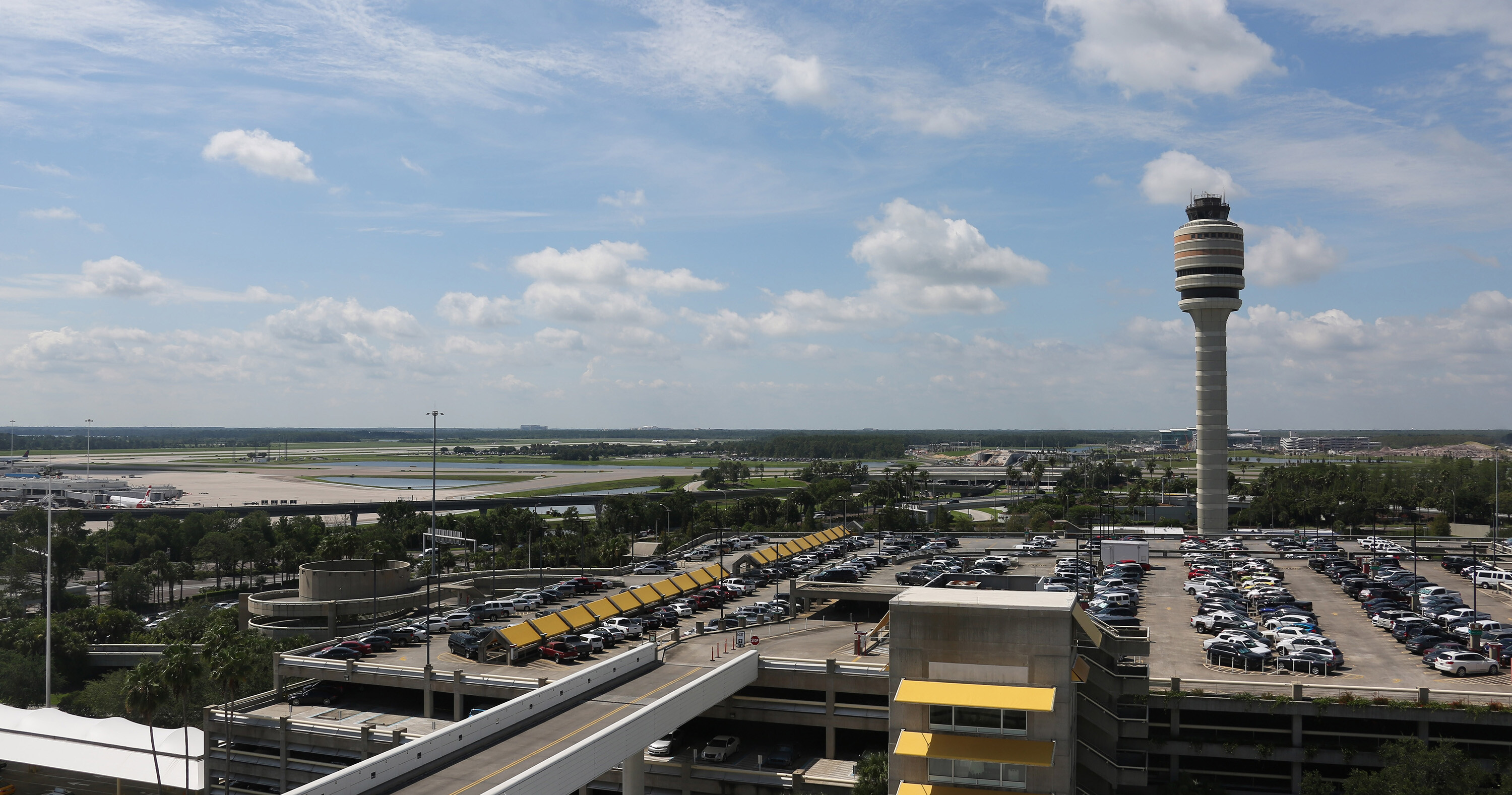 The control tower of the Orlando International Airport is pictured here in June of 2017. The FAA is investigating an incident at the Orlando airport last month in which a single-engine plane and a Delta Boeing 757 came within "close proximity" to one another.