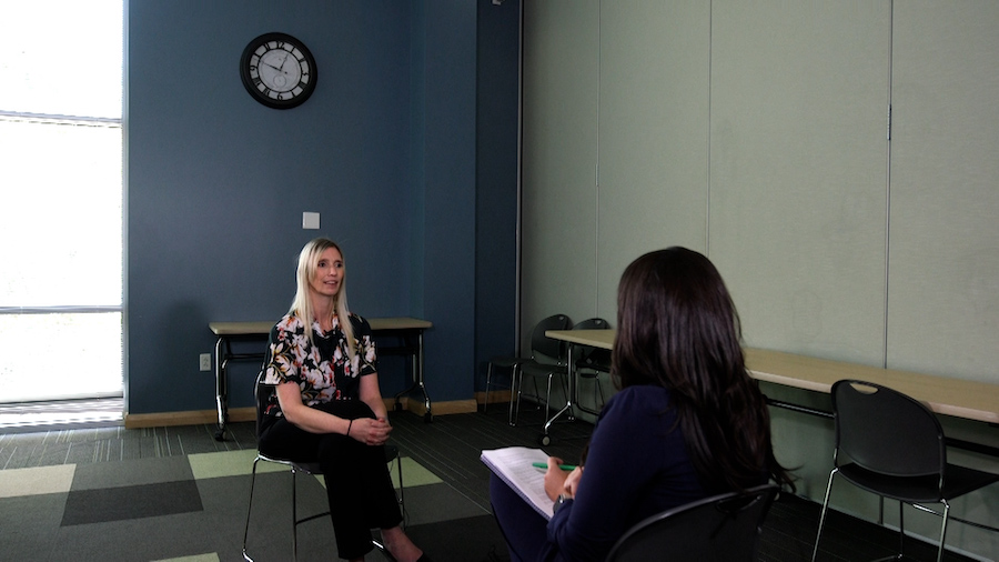 DCFS Strengthening Families Program Administrator Kyla Clark participates in an interview on Aug. 17, 2022.