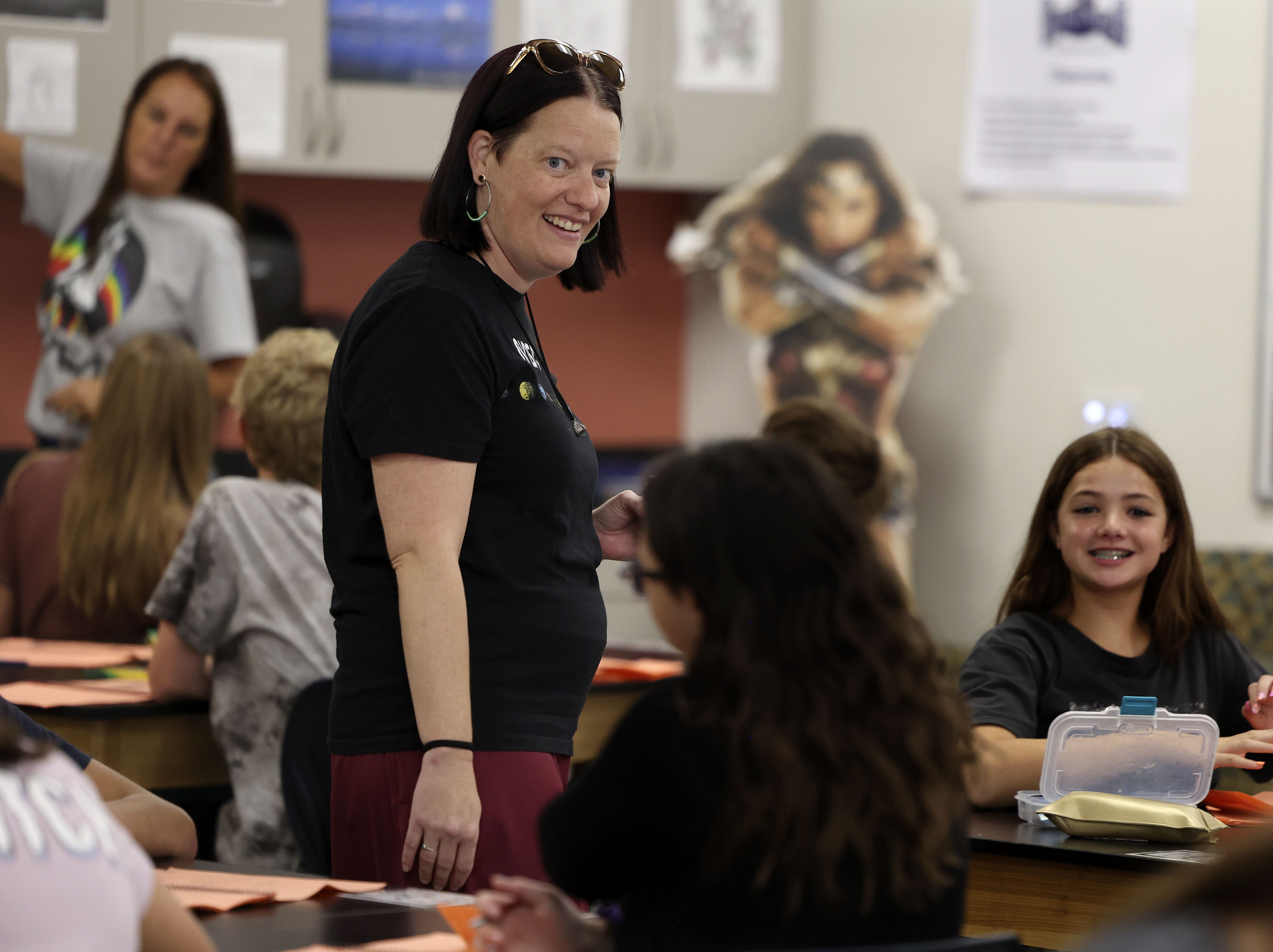 Science teacher Jennifer Muir teaches a class of eighth grade students at Draper Park Middle School on Friday. Muir, who was chosen last year to attend a prestigious NASA-affiliated teacher training program that includes a flight to the stratosphere, leaves Monday, Sept. 12, for the five-day trip. Muir is also one of 24 U.S. educators from 13 states selected as 2022 Airborne Astronomy Ambassadors.