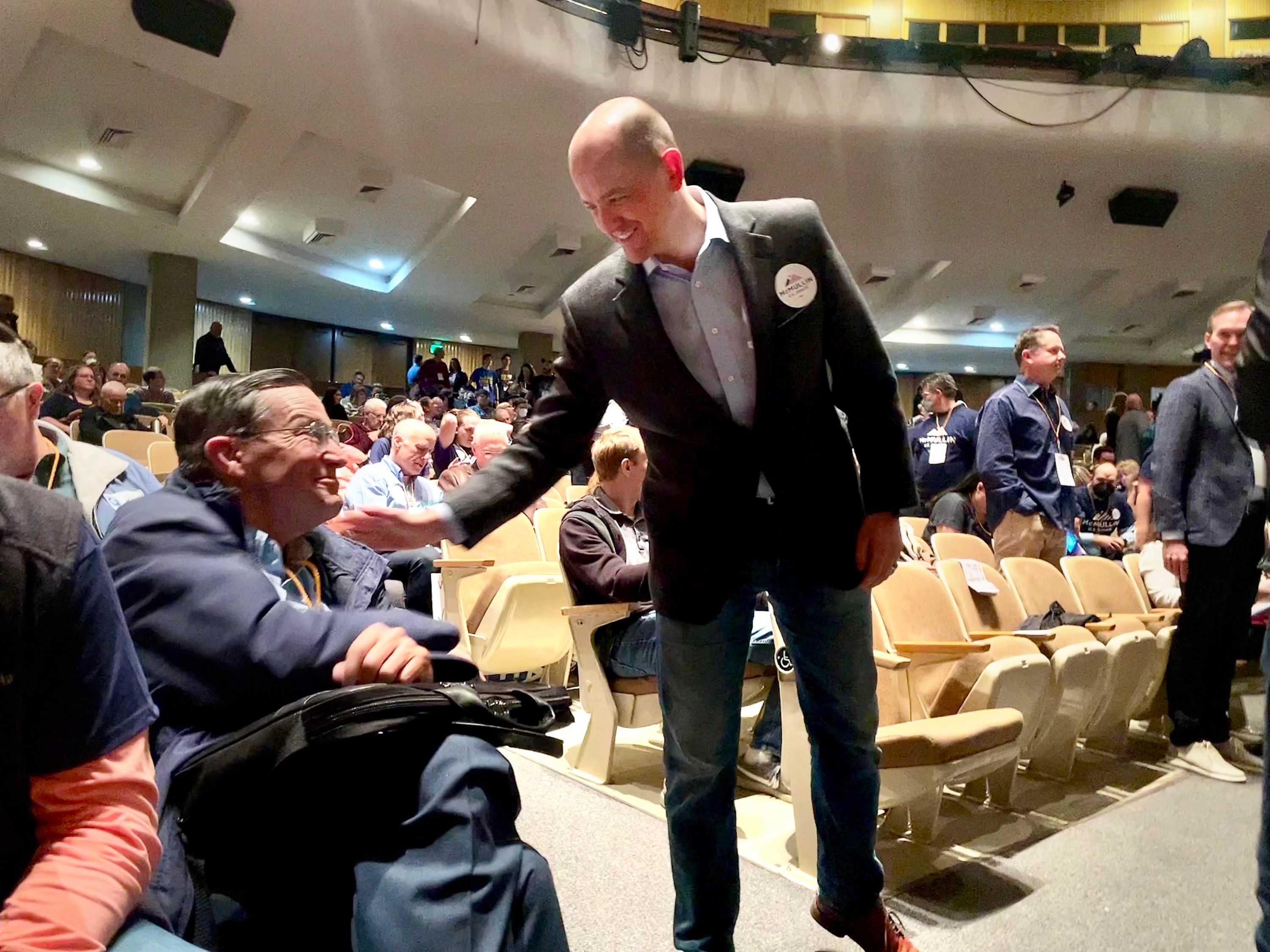 Independent U.S. Senate candidate Evan McMullin shakes hands with a member of the audience at the Democratic State Convention at Cottonwood High School in Murray on April 23. McMullin is running for Sen. Mike Lee’s seat.