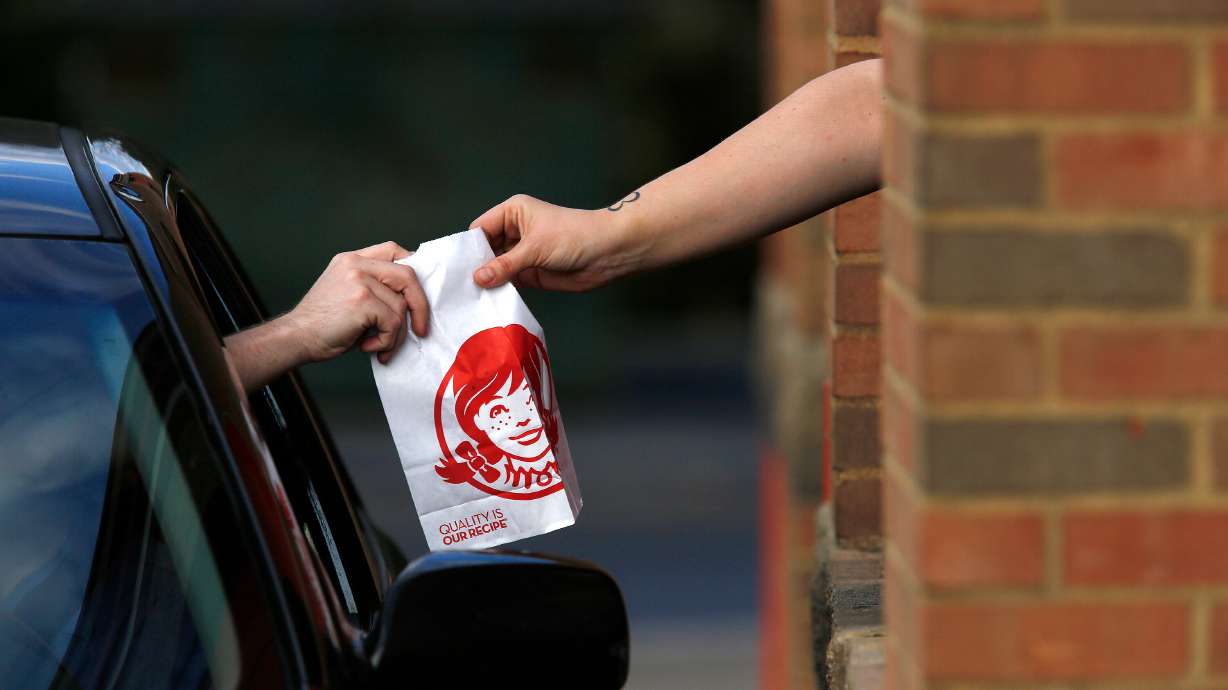 Wendy's restaurants have been associated with an E. coli outbreak now reported in six states, with 97 people infected, the U.S. Centers for Disease Control and Prevention. A drive-through lane at a Wendy's fast food restaurant is pictured in Shelbyville, Kentucky, on Nov. 5, 2017.