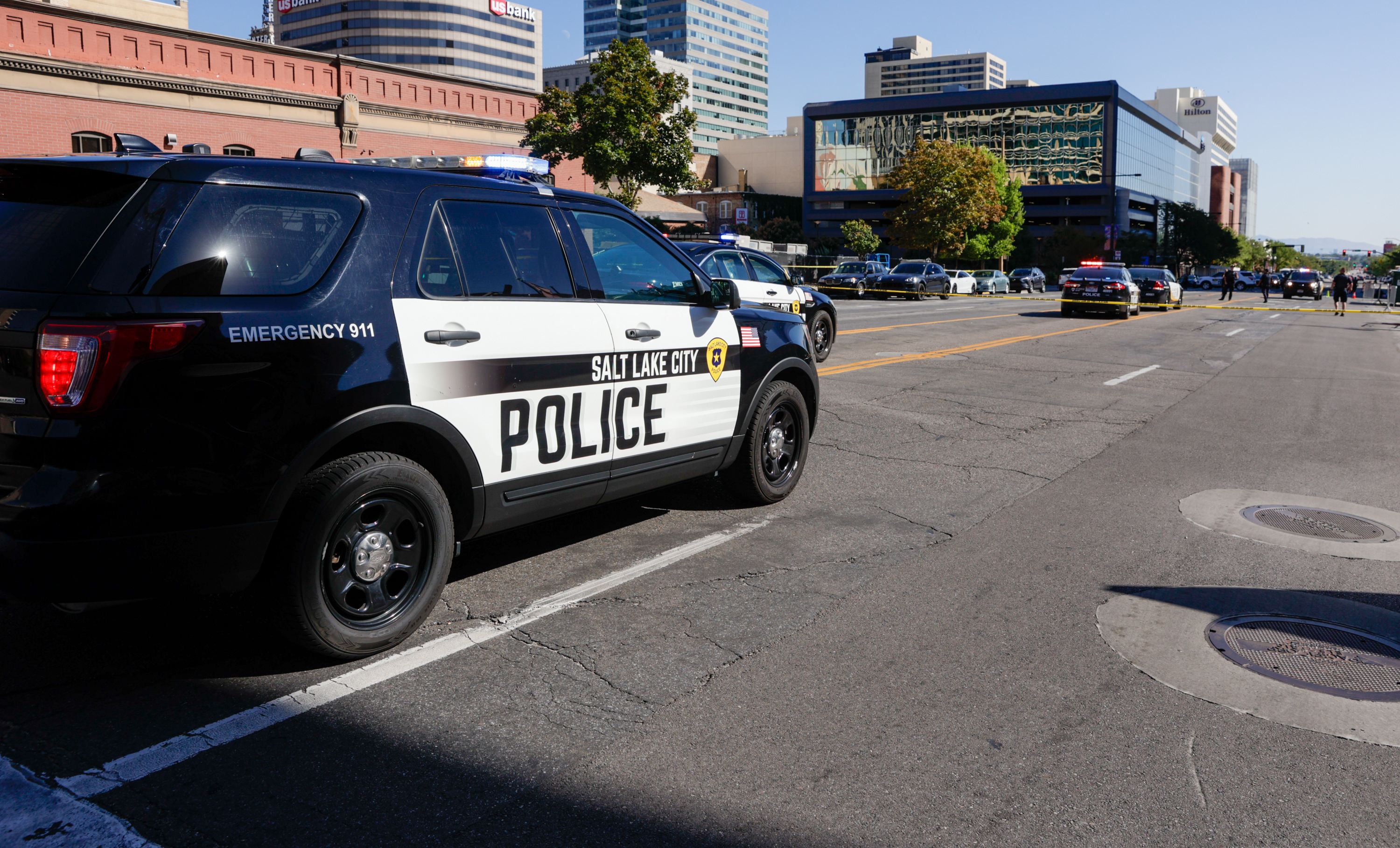 Police cars block 100 South as they investigate a shooting that left one dead in Salt Lake City on Sept. 3, 2022. A jury found the man who fired the gun guilty of murder last week, while another man involved was found not guilty of murder.