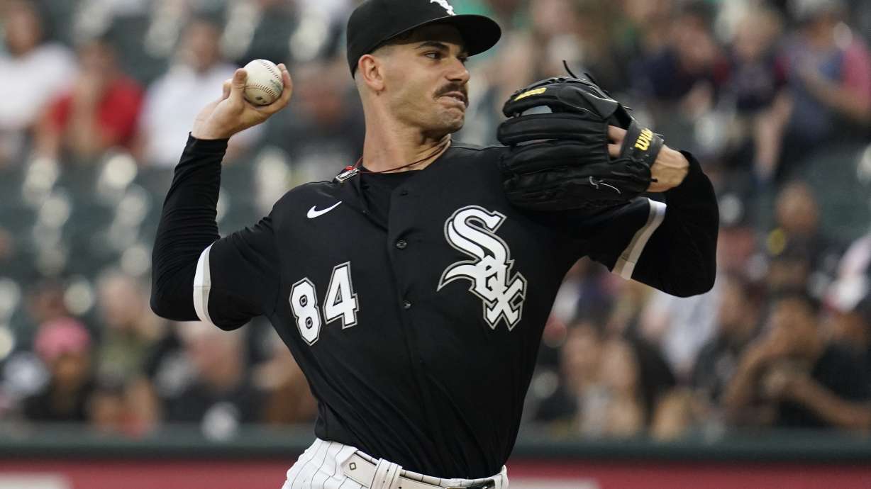 Chicago White Sox starting pitcher Dylan Cease throws against the Minnesota Twins during the first inning of a baseball game in Chicago, Saturday, Sept. 3, 2022.