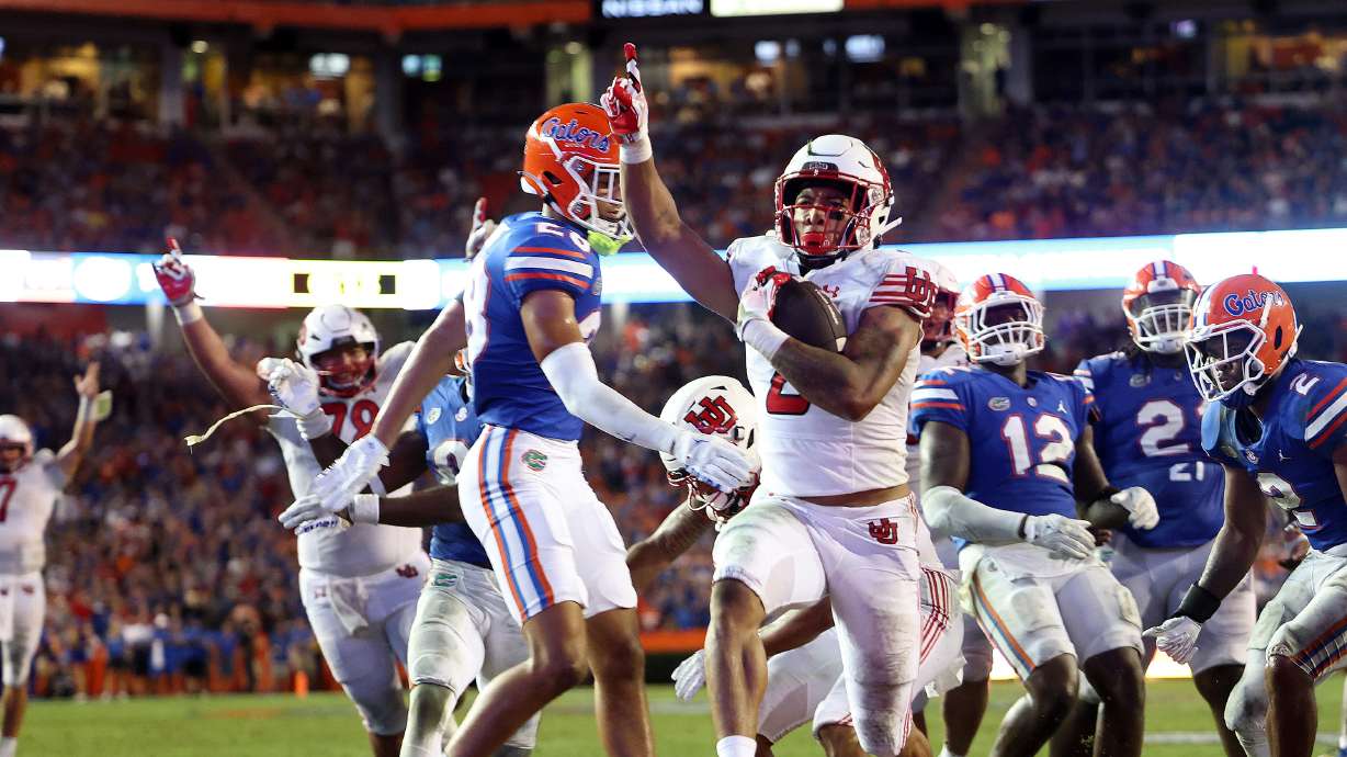 Utah Utes running back Micah Bernard (2) crosses the goal line for a touchdown as Utah and Florida play in Gainesville, Fla., on Saturday, Sept. 3, 2022. Florida won 29-26.