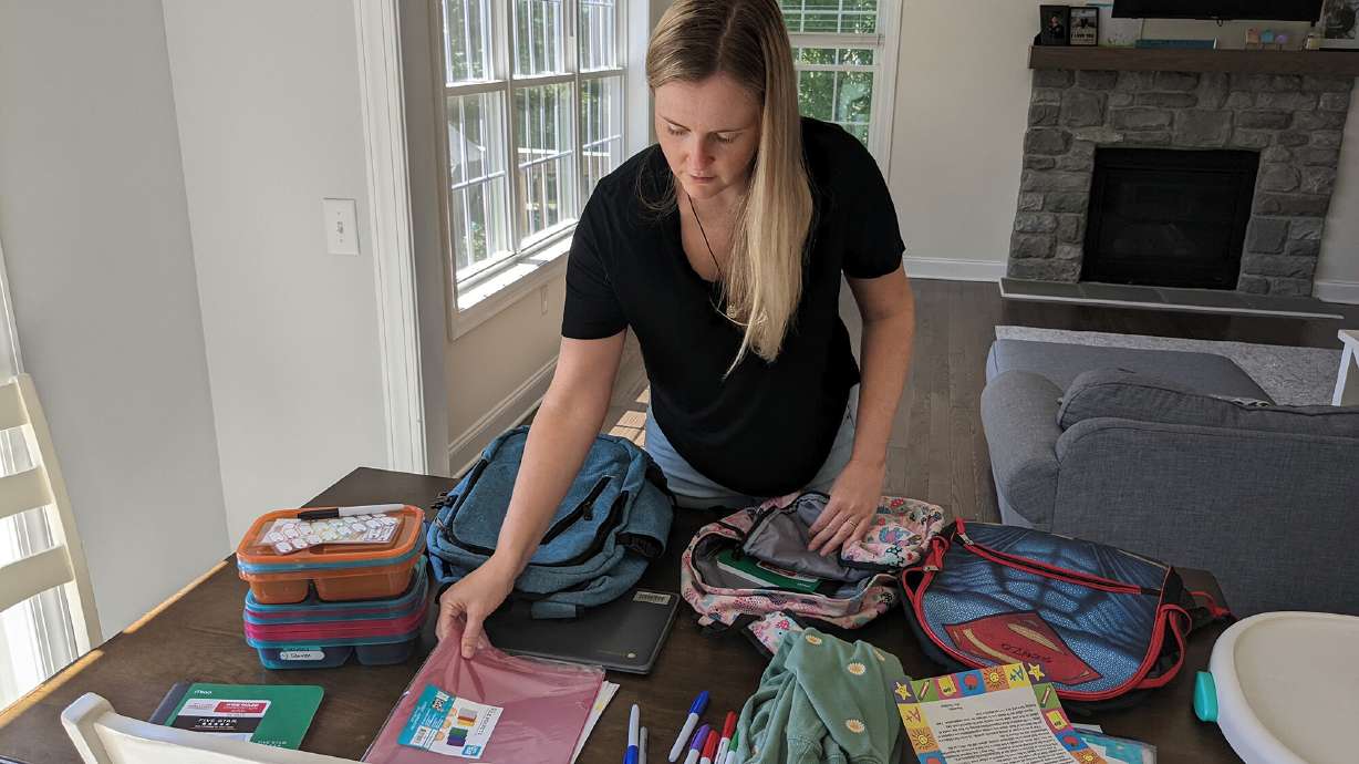 As Sarah Longmore finished her back-to-school shopping, the mother of five looked at a $25 backpack for her preschooler. Soaring inflation had crunched the family's budget, and she decided her daughter could make do with a hand-me-down. She put the backpack back.