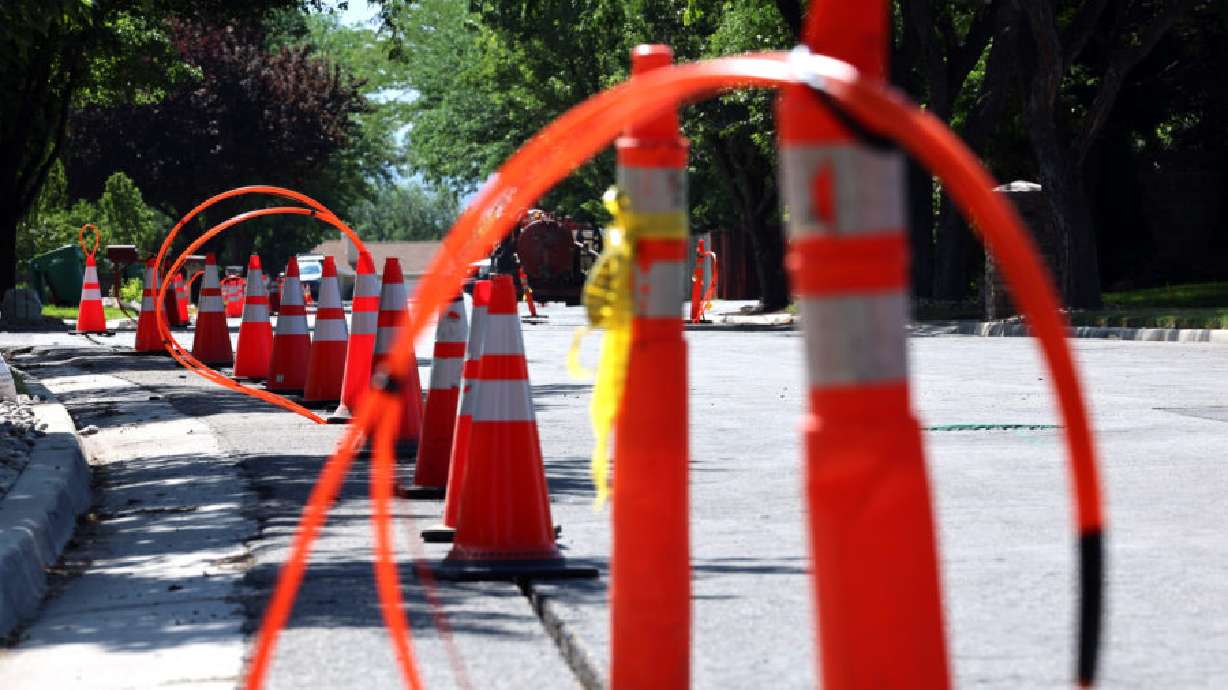 A Google Fiber conduit is laid in Sandy on Tuesday, July 26.