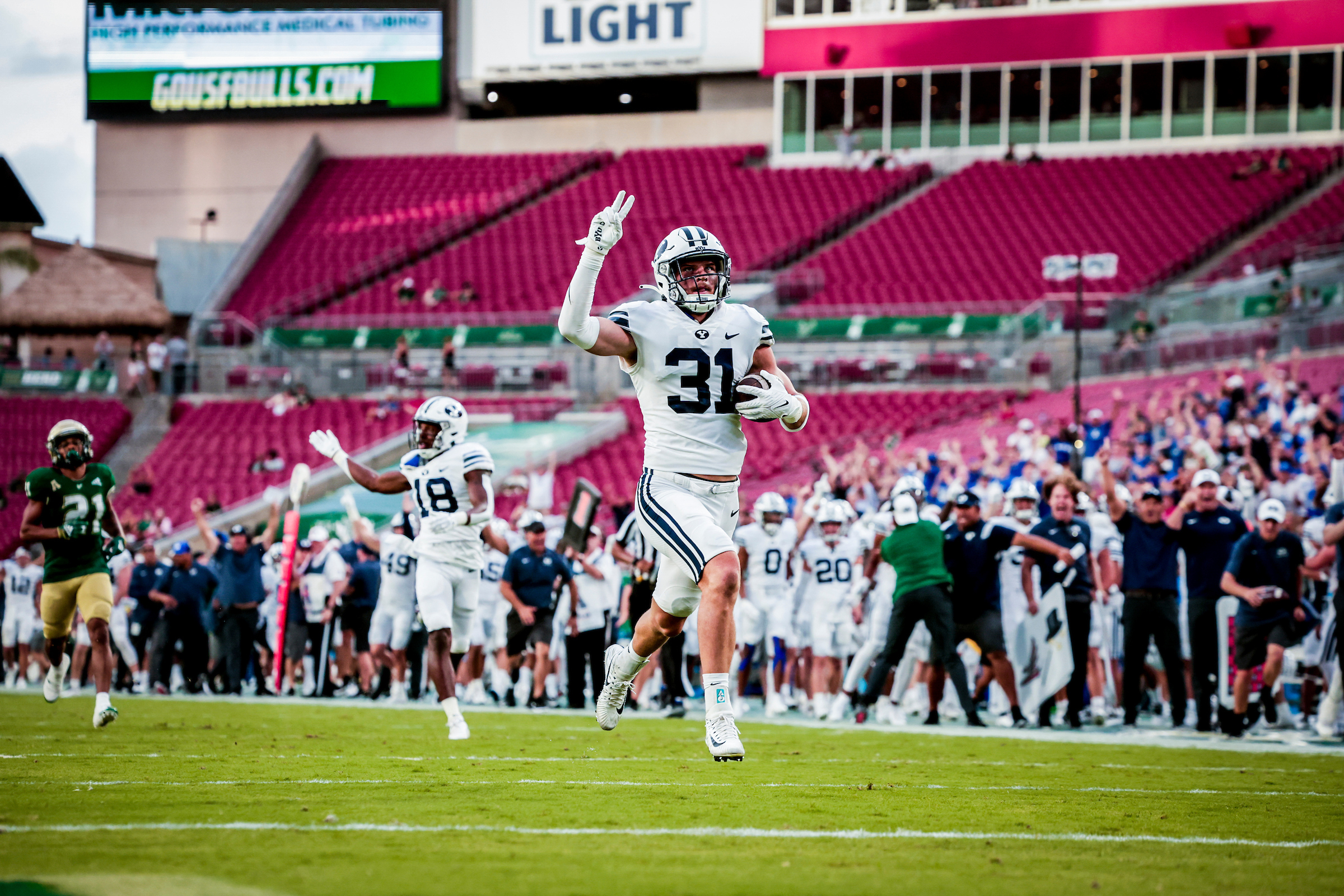 BYU linebacker Max Tooley returns an interception against South Florida, Saturday, Sept. 3, 2022 at Raymond James Stadium in Tampa, Fla.