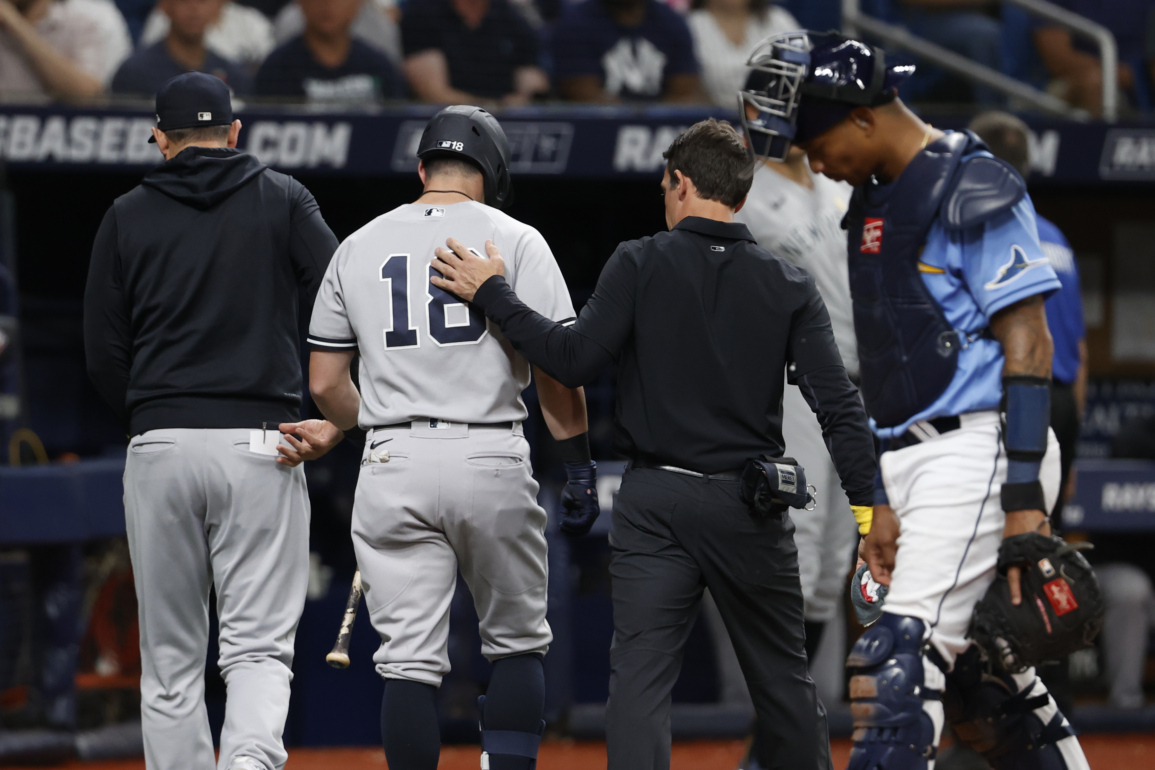 New York Yankees' Andrew Benintendi, who was batting, leaves the team's baseball game against the Tampa Bay Rays during the third inning Friday, Sept. 2, 2022, in St. Petersburg, Fla. 