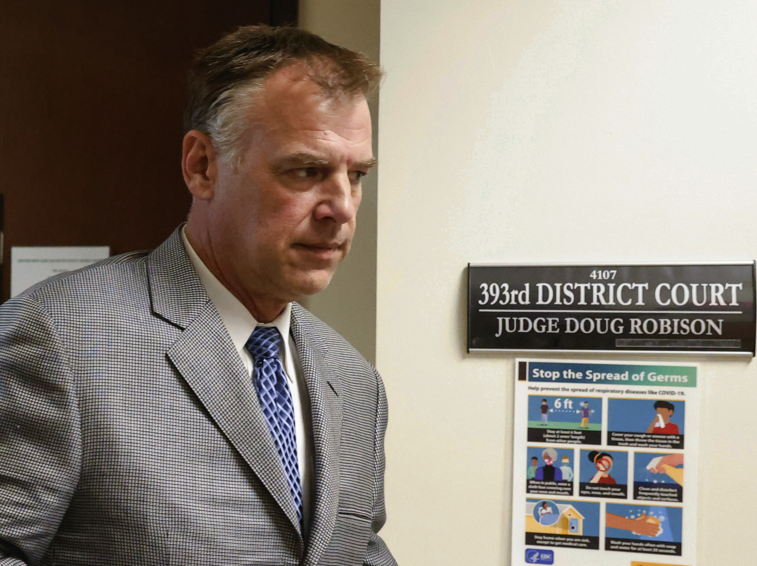 Former Texas Rangers pitcher John Wetteland leaves the courtroom after the judge declared a mistrial in his sexual abuse trial after the jury said they were deadlocked, Friday, Sept. 2, 2022, in Denton, Texas.