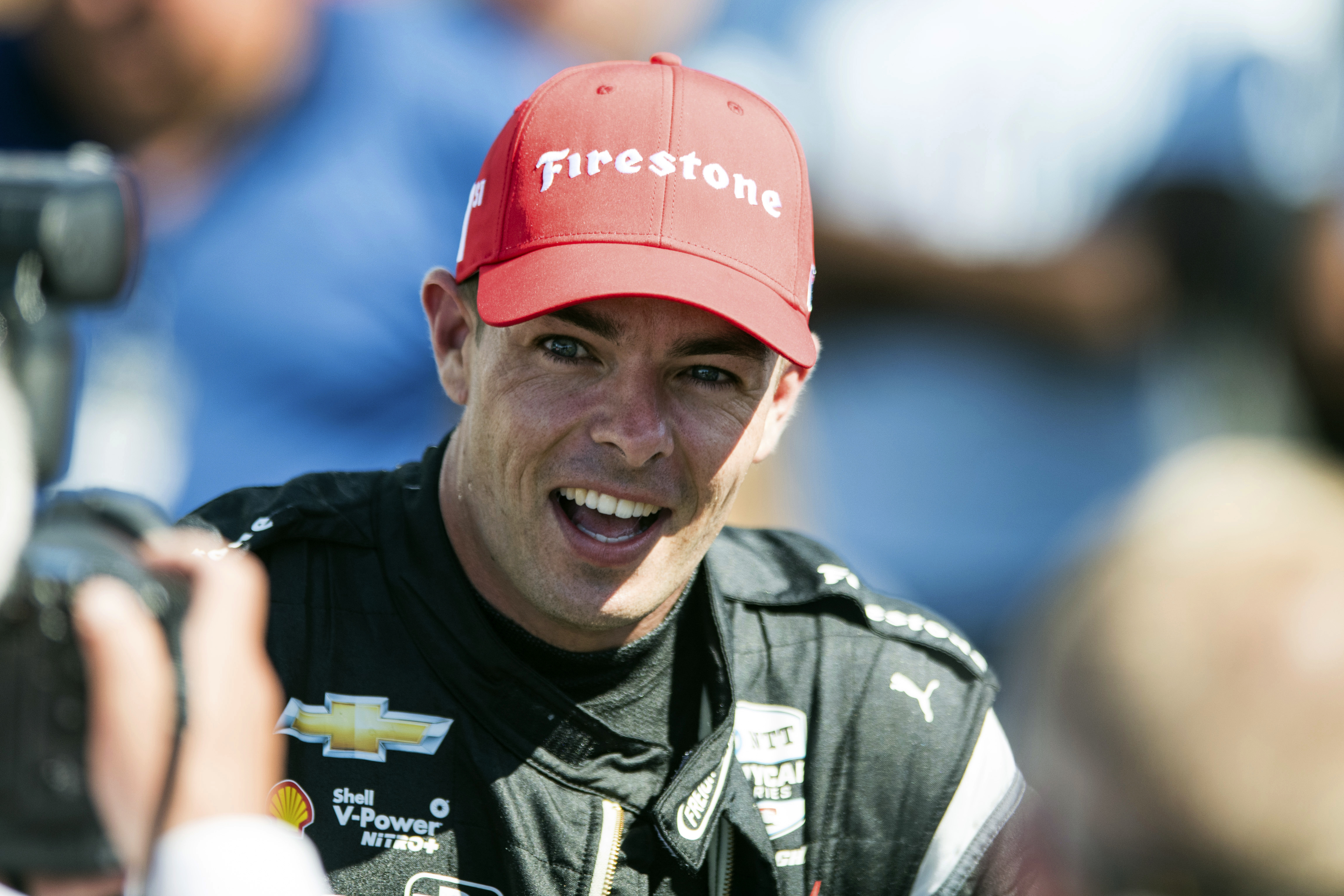 Scott McLaughlin smiles after his victory at the Grand Prix of Portland IndyCar auto race at the Portland International Raceway in Portland, Ore., on Sunday, Sept. 4, 2022. 