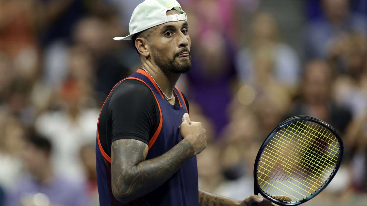 Nick Kyrgios, of Australia, walks across the court after winning his match against Daniil Medvedev, of Russia, during the fourth round of the U.S. Open tennis championships, Sunday, Sept. 4, 2022, in New York.