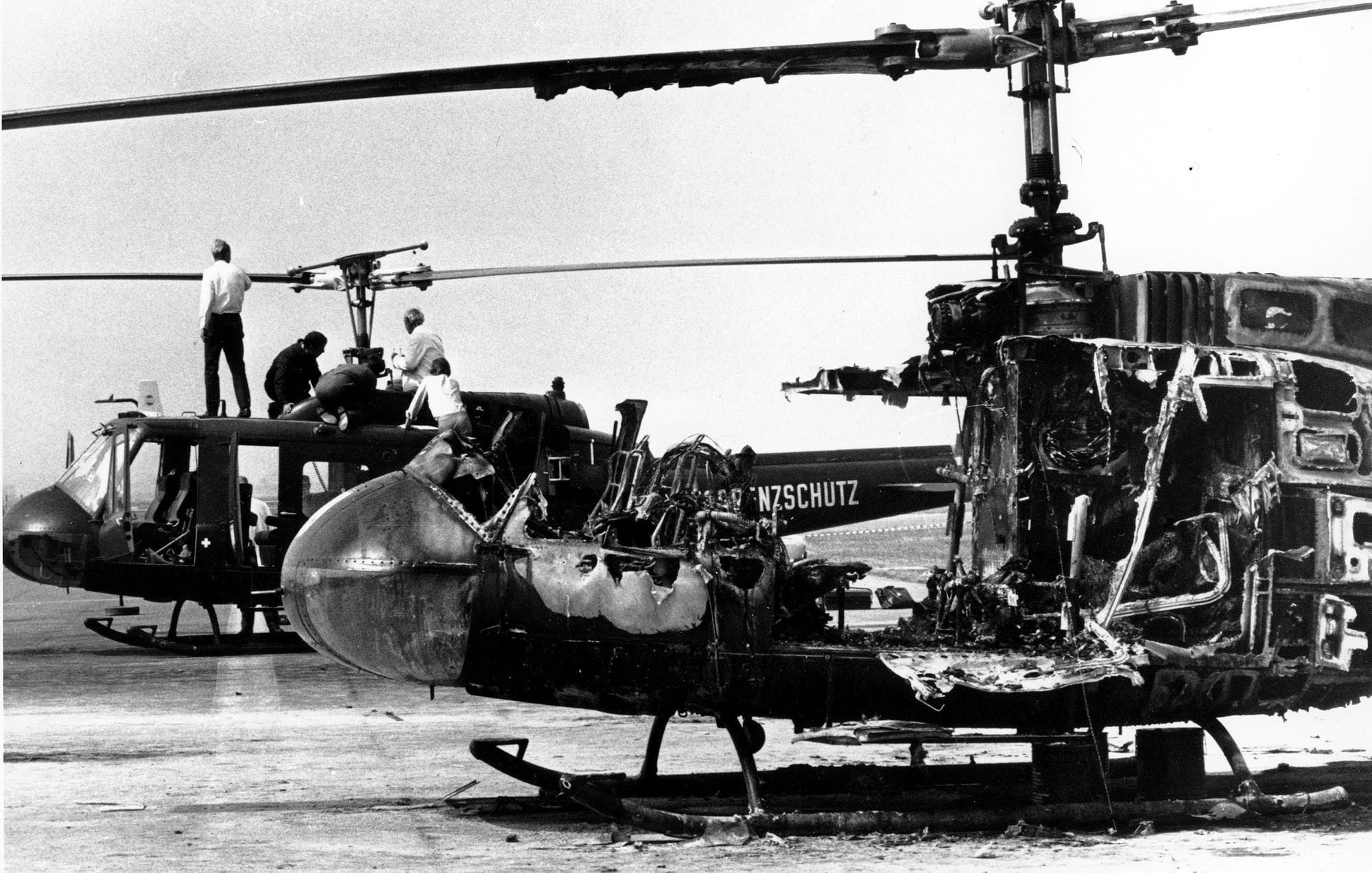 CLARIFICATION IN THE SECOND SENTENCE - FILE - Two West German border police helicopters that carried armed terrorists and their nine Israeli Olympian hostages, stand at Fuerstenfeldbruck air force base, twenty miles west of Munich, Germany, on Sept. 7, 1972. The German and Israeli presidents are to join relatives of the 11 Israeli athletes killed in the attack by Palestinian militants on the 1972 Munich Olympics to mark the 50th anniversary.   