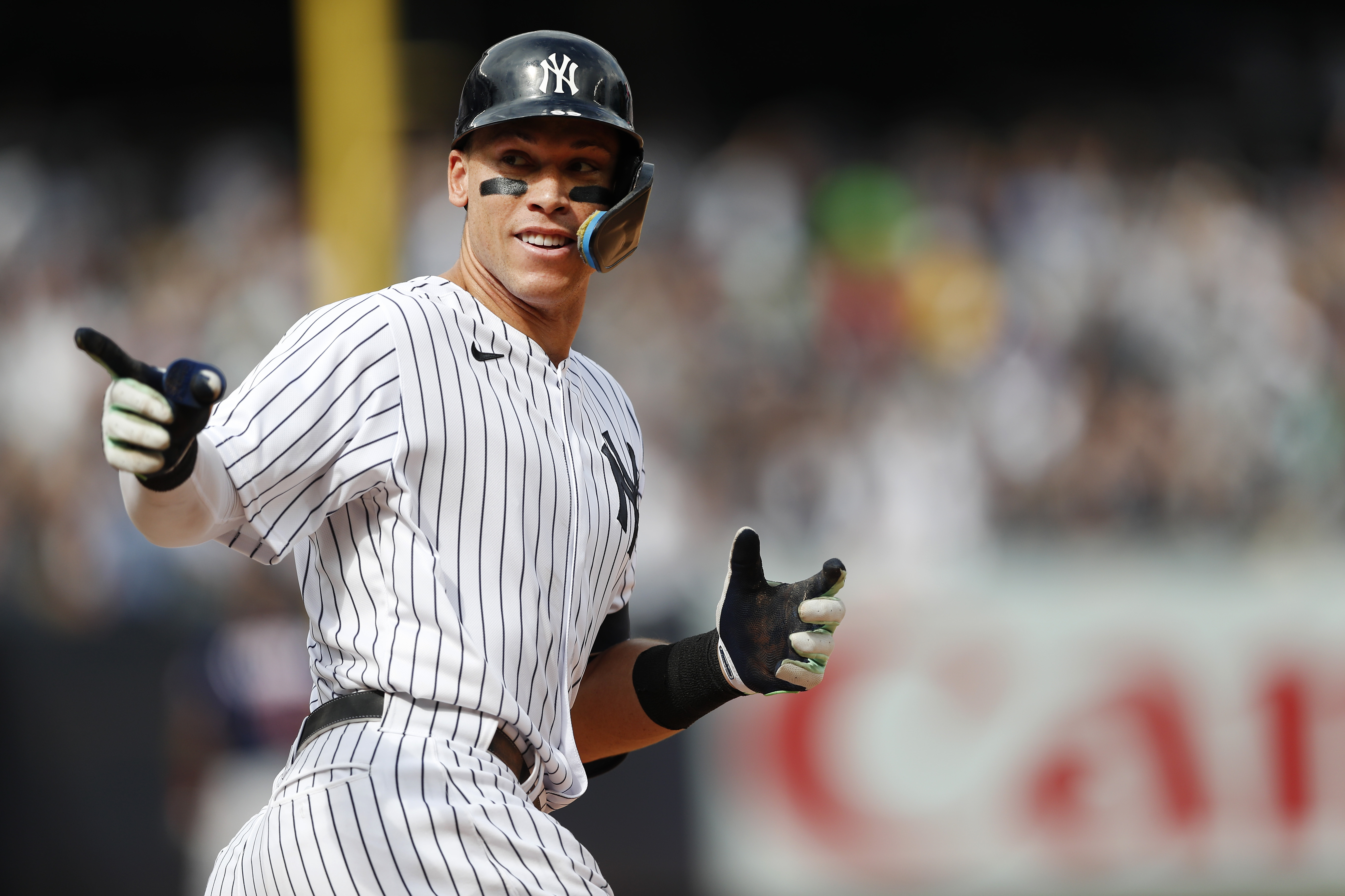 New York Yankees right fielder Aaron Judge (99) reacts while rounding the bases after hitting a home run against the Minnesota Twins during the sixth inning of a baseball game Monday, Sept. 5, 2022, in New York. 