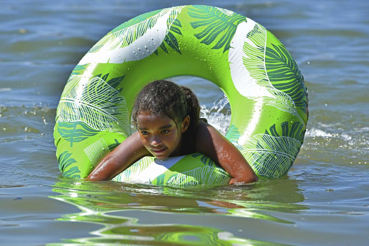 Amaya Nears, 10, of Oakley, swims in the water on Labor Day in Benicia, Calif., on Monday. The Bay Area is experiencing an excessive heat warning as temperatures soar above 104 degrees in the East Bay.
