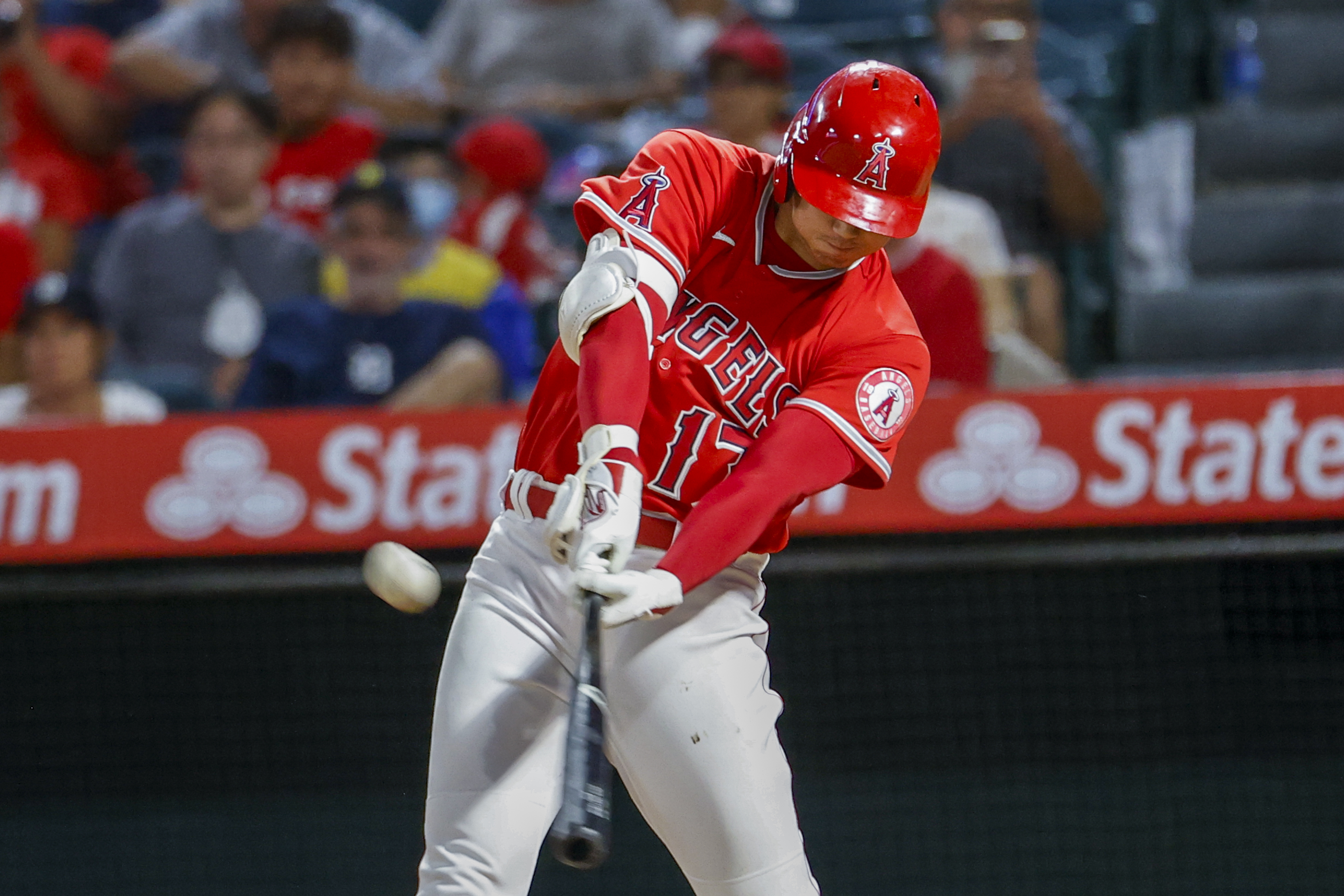 Los Angeles Angels' Shohei Ohtani hits a solo home run during the seventh inning of a baseball game against the Detroit Tigers in Anaheim, Calif., Monday, Sept. 5, 2022. 