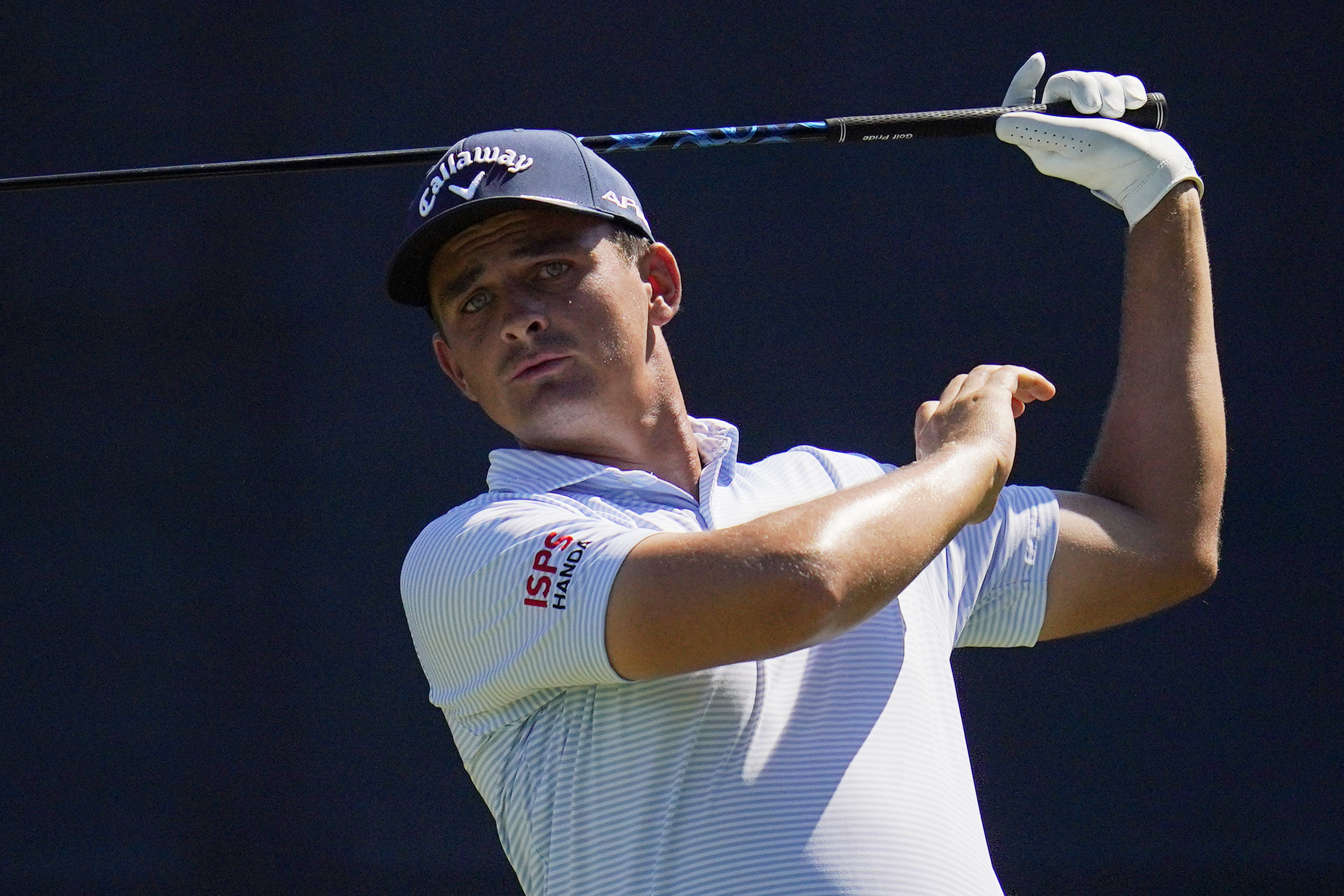 Christiaan Bezuidenhout, of South Africa, watches his drive on the 18th hole during the third round of the BMW Championship golf tournament at Wilmington Country Club, Saturday, Aug. 20, 2022, in Wilmington, Del.