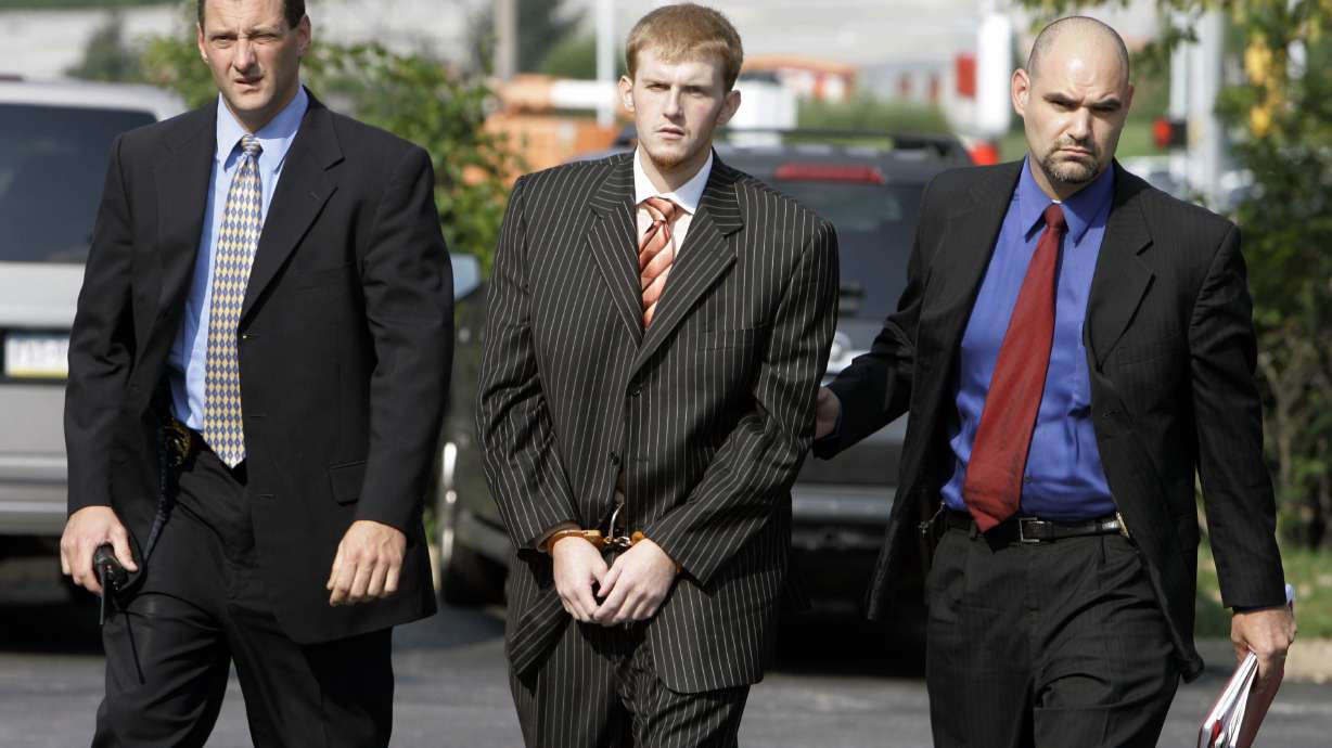 FILE - In this Aug. 29, 2007, file photo, Britt Reid is escorted into the Montgomery County district court house in Conshohocken, Pa. Former Kansas City Chiefs assistant coach Britt Reid is scheduled to enter a guilty plea to felony driving while intoxicated related to a car crash that seriously injured a young girl. Jackson County Circuit Court online records show Reid, the son of Chiefs coach Andy Reid, is scheduled to plead guilty on Monday, Sept. 12, 2022.