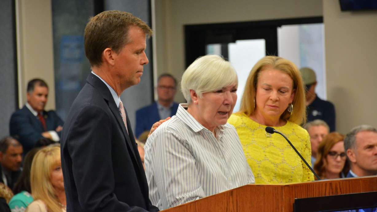 Gail Miller, center, speaks while David Huntsman and his sister, Christena Huntsman Durham, look on during a Davis School District board meeting in Farmington on Tuesday. The Larry H. & Gail Miller Family Foundation and the Huntsman Foundation announced a donation of $1 million for the construction of teen resource centers for at-risk students in Davis School District.
