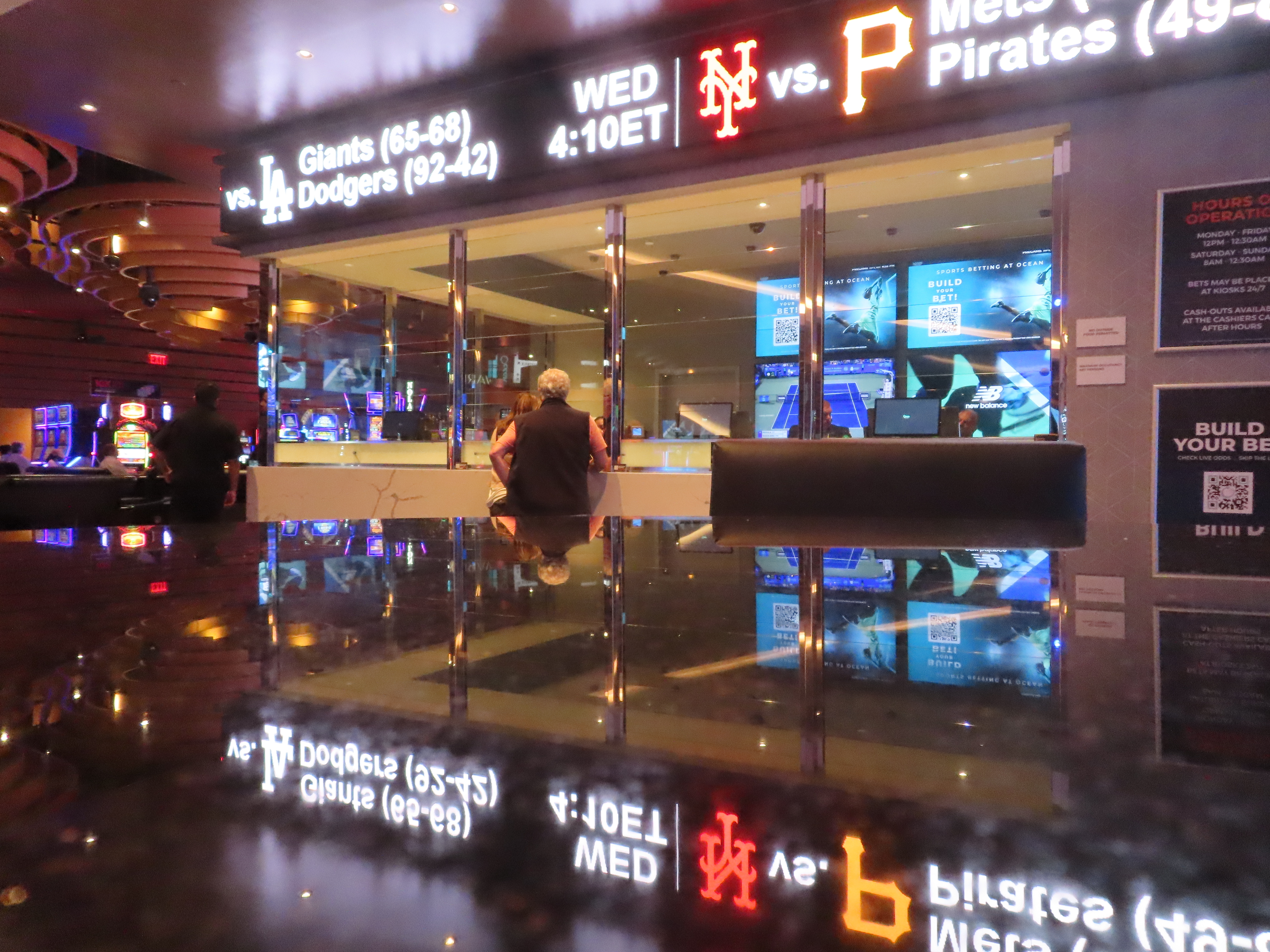 A customer makes a sports bet at the Ocean Casino Resort in Atlantic City, N.J. on Sept. 6, 2022. In the fifth year of legal sports betting in most U.S. states, the action is speeding up due to microbetting, the ability to place a bet on an outcome as narrowly targeted as the result of the next pitch in baseball or the next play in football. 