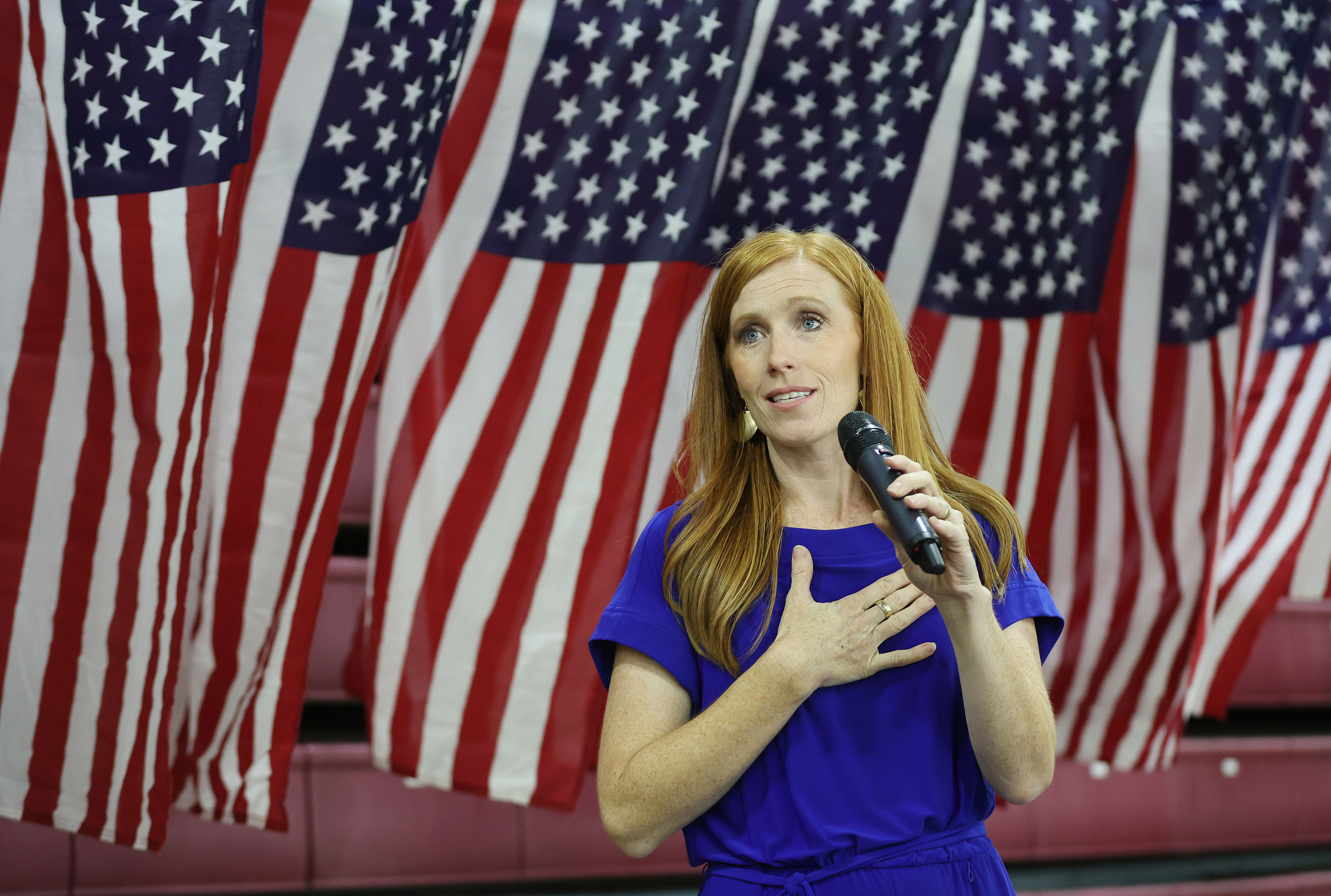 Jennie Taylor, founder of the Major Brent Taylor Foundation, speaks during the opening of the "Davis Remembers" 9/11 museum exhibit at the Legacy Events Center in Farmington on Wednesday.