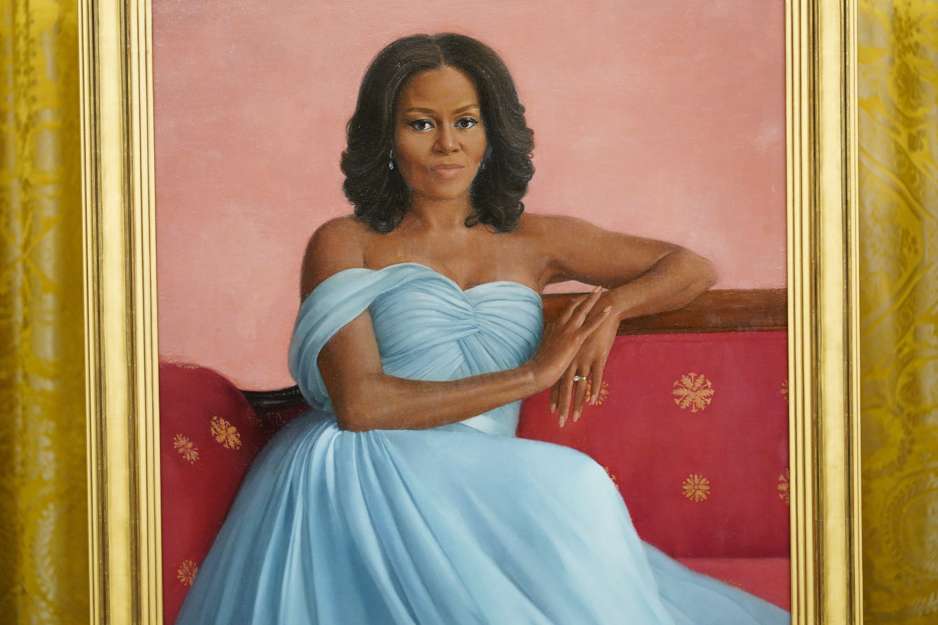 Former first lady Michelle Obama's official White House portrait is displayed during a ceremony in the East Room of the White House, Wednesday, in Washington. The former first lady chose artist Sharon Sprung to do her portrait. 