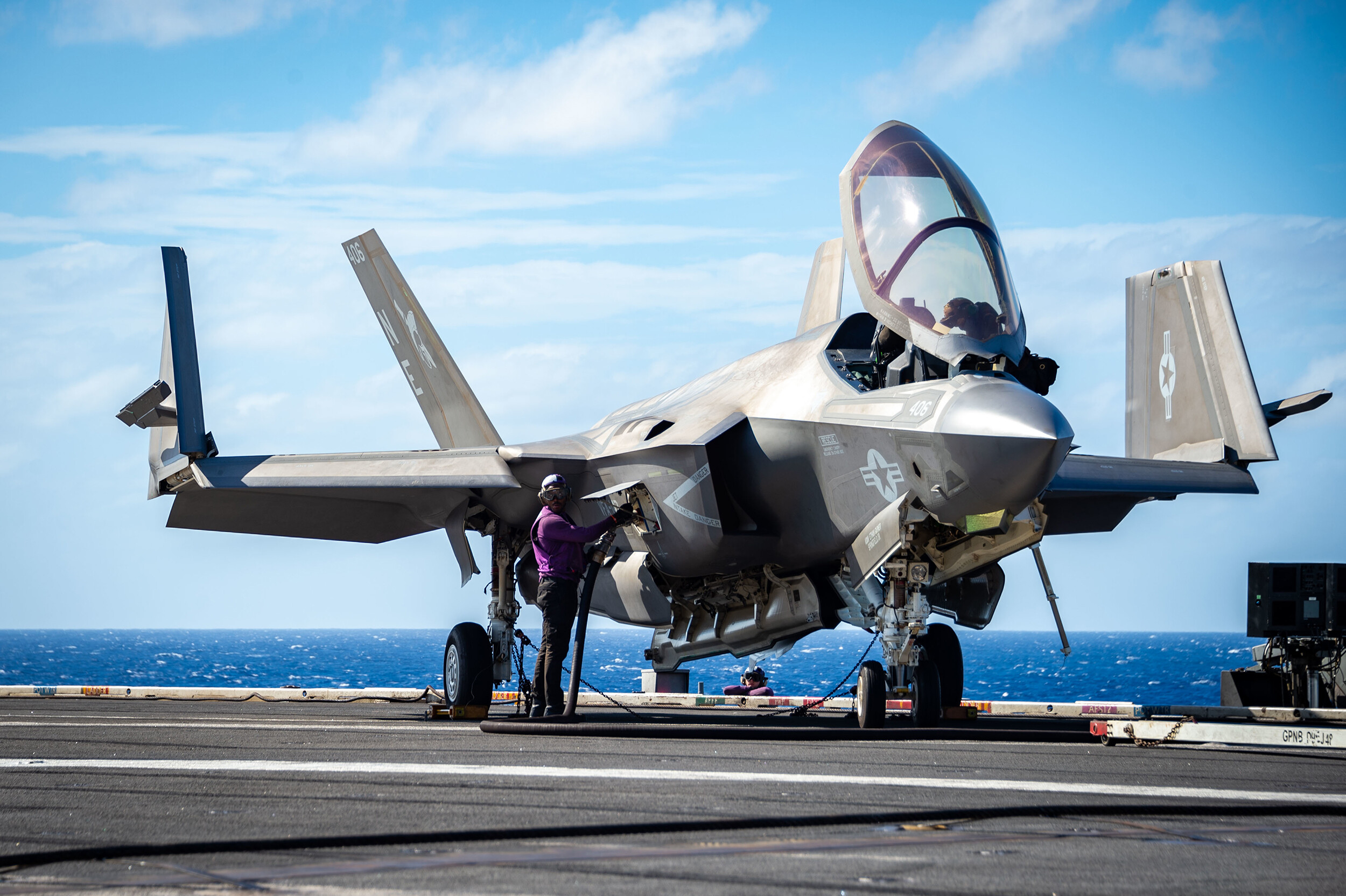 A Sailor fuels an F-35C Lightning II, assigned to the "Argonauts" of Strike Fighter Squadron 147, on the flight deck aboard Nimitz-class aircraft carrier USS Carl Vinson, Jan. 19.