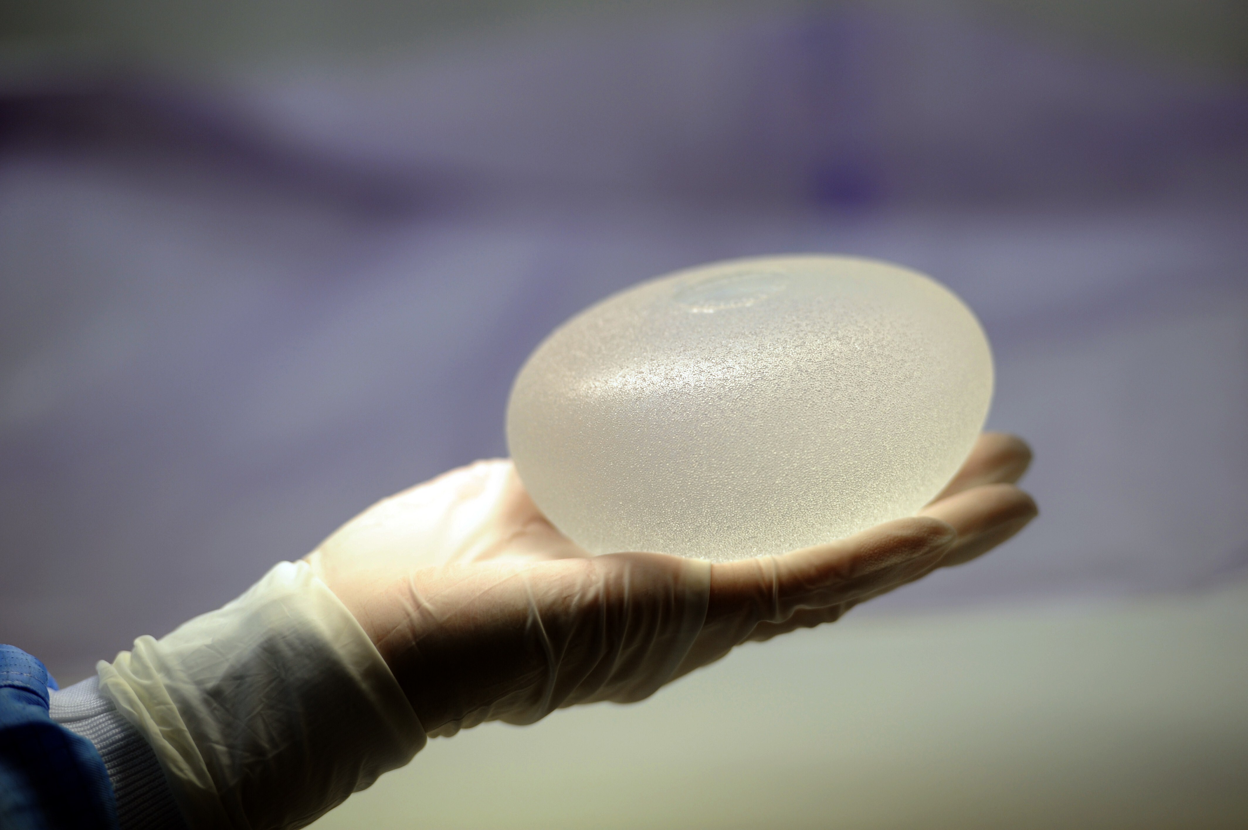 The U.S. Food and Drug Administration is alerting the public about certain cancers, including squamous cell carcinoma and various lymphoma, that have been reported in the scar tissue that forms around breast implants.