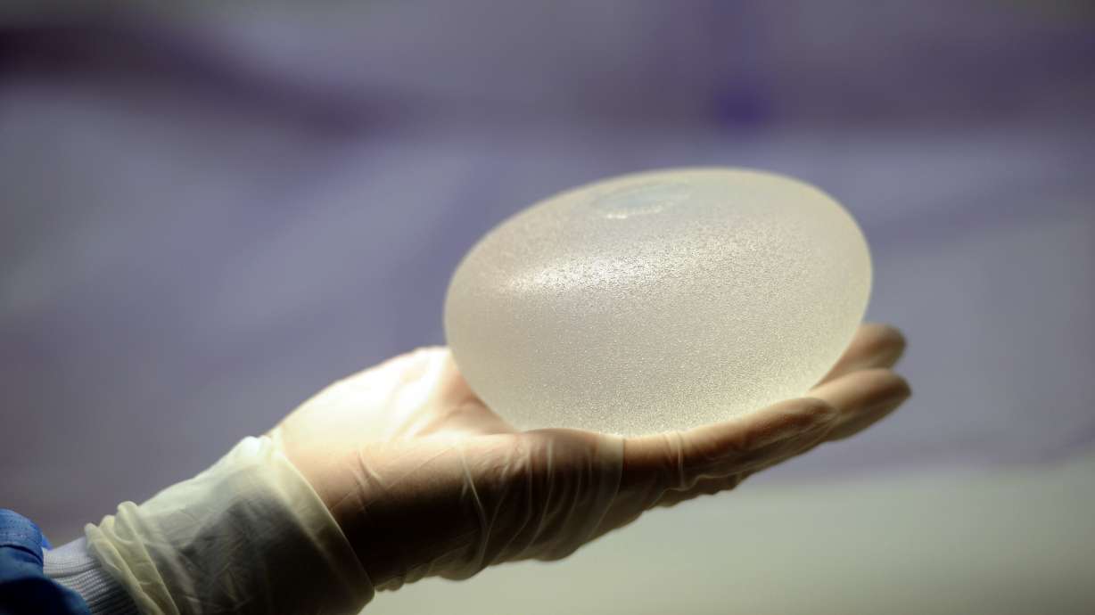 The U.S. Food and Drug Administration is alerting the public about certain cancers, including squamous cell carcinoma and various lymphoma, that have been reported in the scar tissue that forms around breast implants.