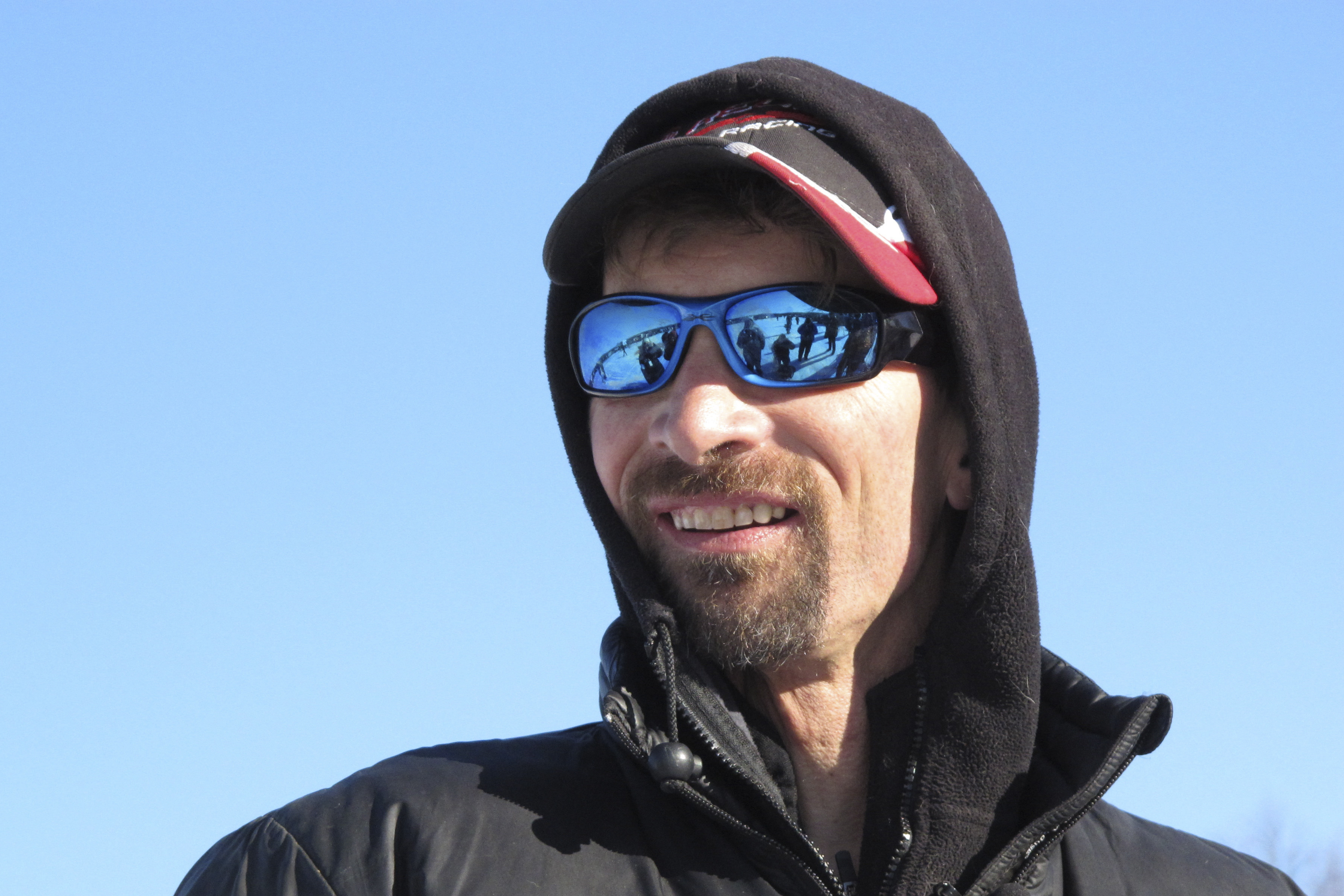 FILE - Four-time defending Iditarod Trail Sled Dog champion Lance Mackey talks to reporters in Willow, Alaska, on March 6, 2011. Mackey, a four-time Iditarod Trail Sled Dog Race winner and one of mushing’s most colorful and accomplished champions who also suffered from health and drug issues, died Wednesday, Sept. 7, 2022, his father and kennel announced on Facebook. He was 52.   