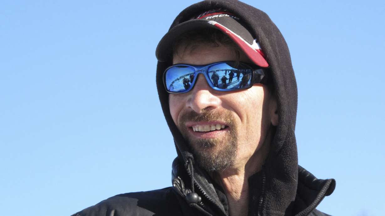 FILE - Four-time defending Iditarod Trail Sled Dog champion Lance Mackey talks to reporters in Willow, Alaska, on March 6, 2011. Mackey, a four-time Iditarod Trail Sled Dog Race winner and one of mushing’s most colorful and accomplished champions who also suffered from health and drug issues, died Wednesday, Sept. 7, 2022, his father and kennel announced on Facebook. He was 52.