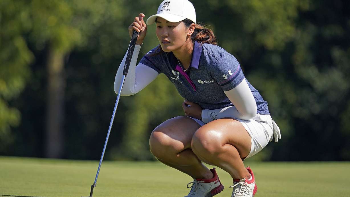 Xiyu Janet Lin, of China, lines up a a putt on the 18th green during the third round of the Dana Classic LPGA golf tournament Saturday, Sept. 3, 2022, at Highland Meadows Golf Club in Sylvania, Ohio.