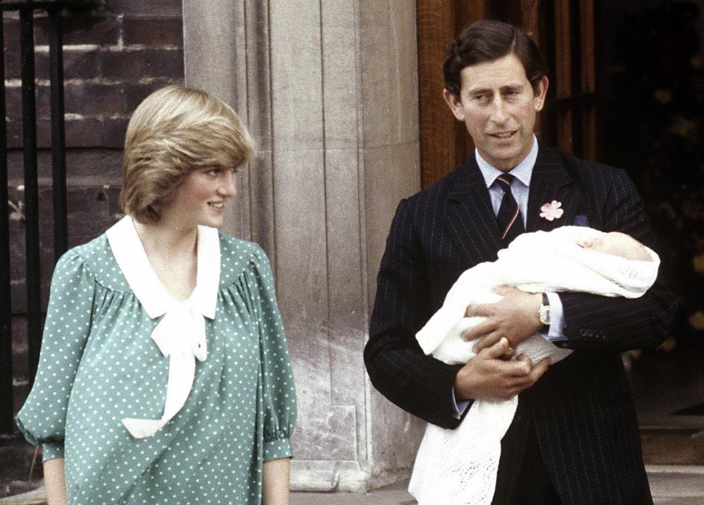 In this June 22, 1982, photo, Britain's Prince Charles, Prince of Wales, and wife Princess Diana take home their newborn son Prince William, as they leave St. Mary's Hospital in London.