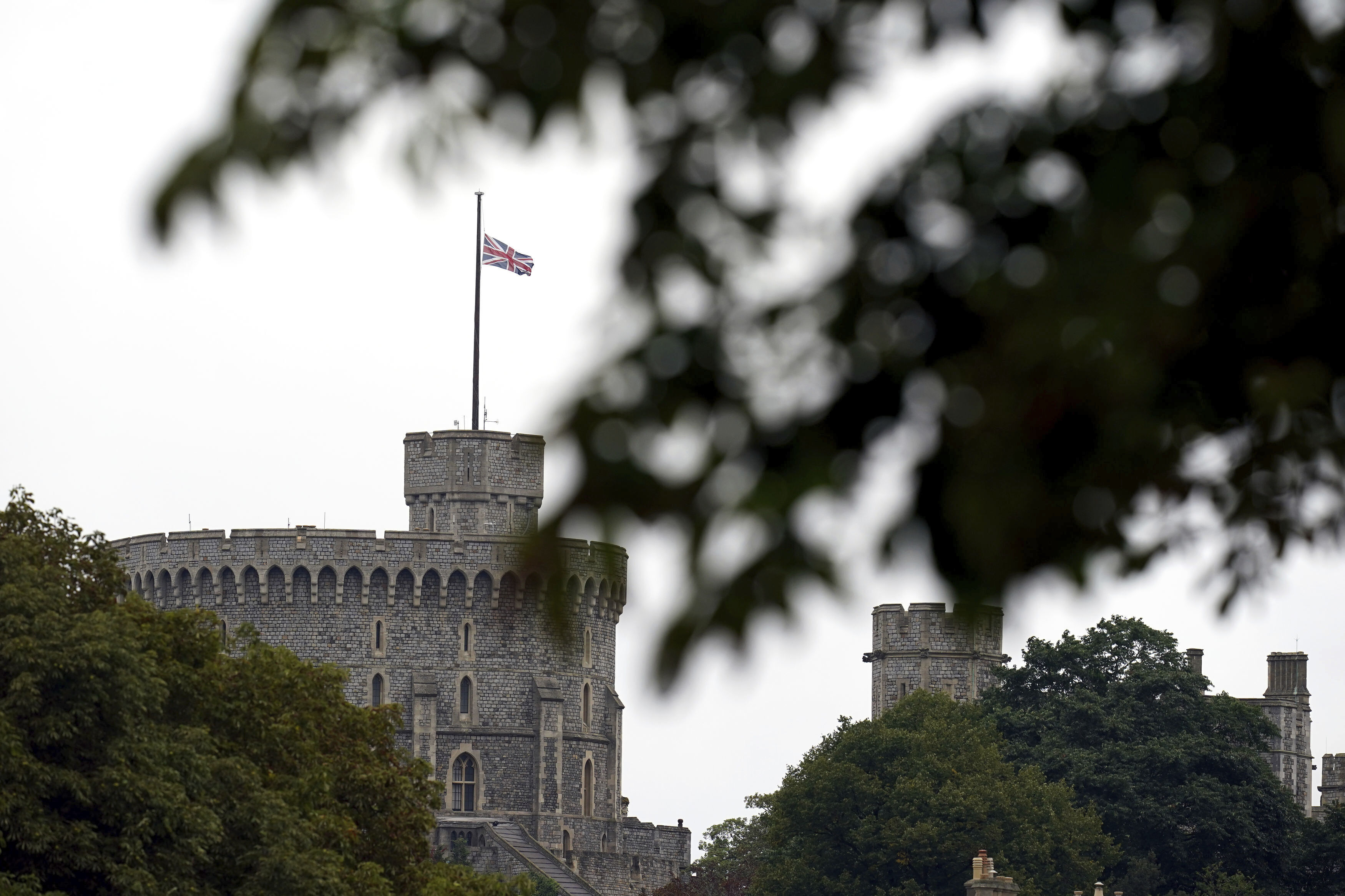 The British flag flies at half mast at Windsor Castle, Berkshire, following Thursday's death of Queen Elizabeth II, Friday. Queen Elizabeth II, Britain's longest-reigning monarch and a rock of stability across much of a turbulent century, died Thursday at the age of 96 after 70 years on the throne.