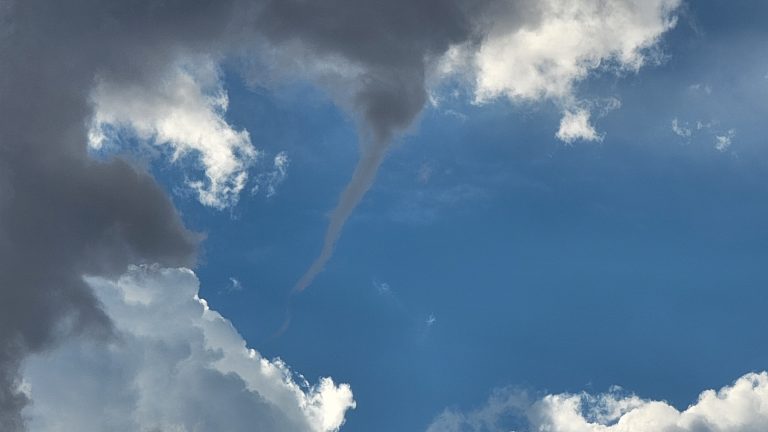 A funnel cloud over the Santa Clara-Ivins area seen from St. George, Thursday.