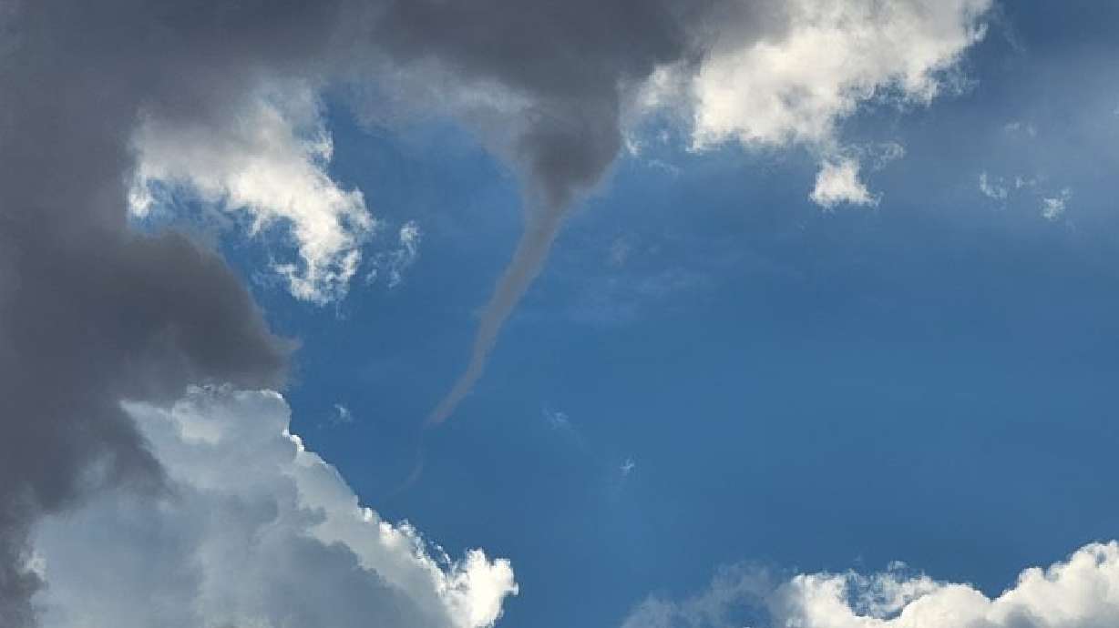 A funnel cloud over the Santa Clara-Ivins area seen from St. George, Thursday.