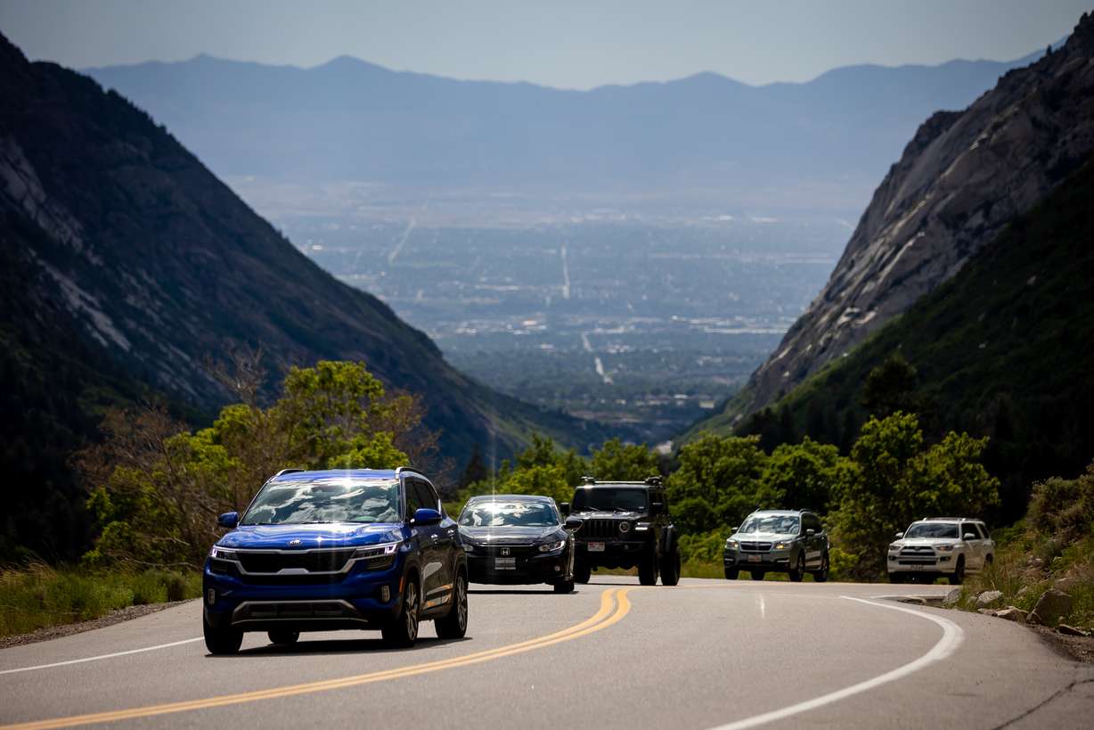 Vehicles drive up Little Cottonwood Canyon on June 29, 2021.