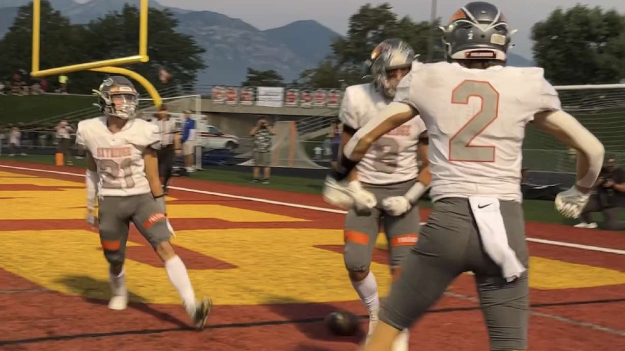 Skyridge's Cannon Jensen celebrates a touchdown during the Falcons' 20-13 win over Timpview, Friday, Sept. 9, 2022 at Mountain View High School in Orem.