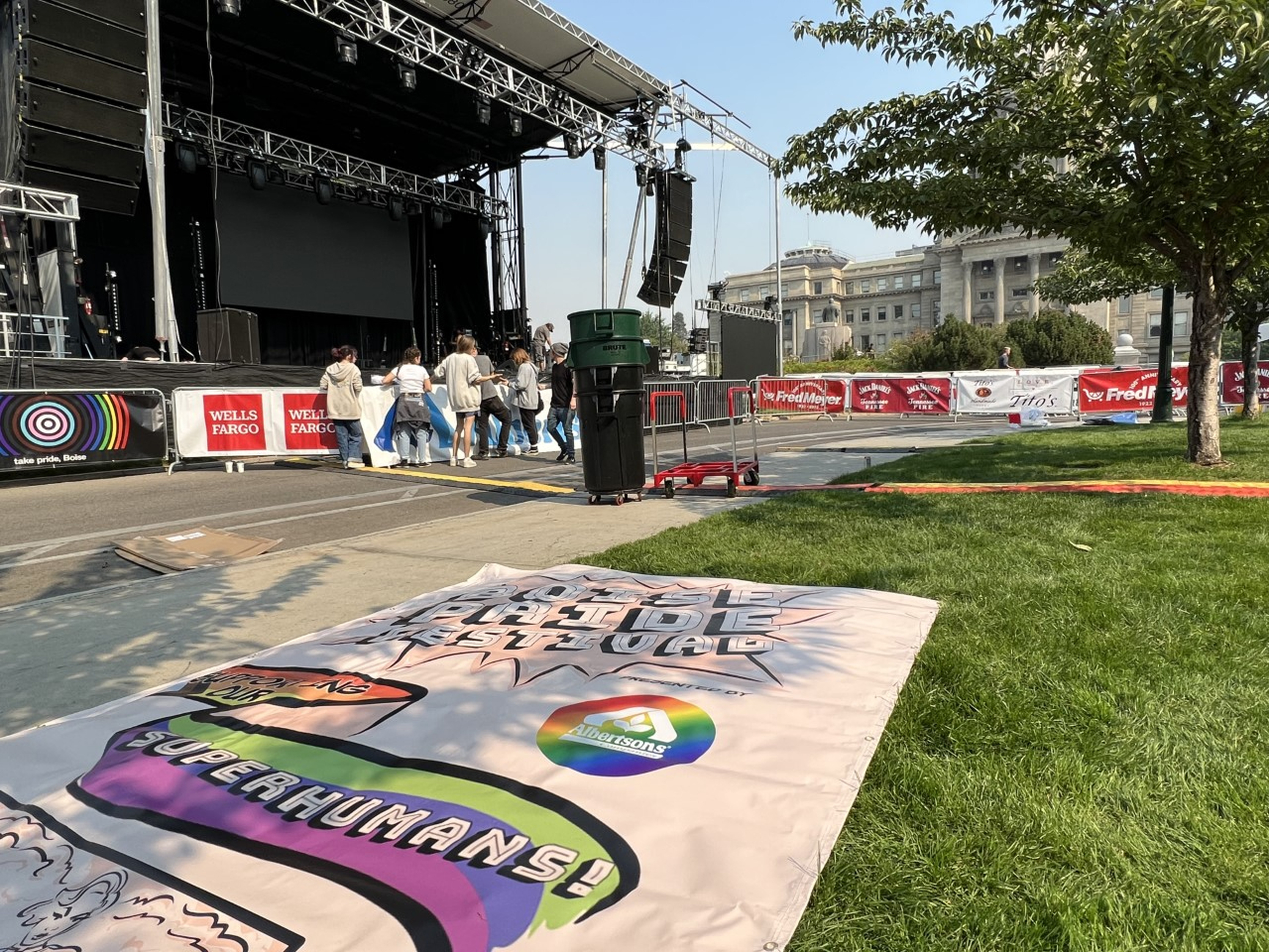 Volunteers help set up for the three-day Boise Pride Festival on Friday in Boise, Idaho. Organizers of the festival have been subjected to intense political pushback from the Idaho GOP and conservative groups in part because of a "Drag Kids" performance scheduled for Sunday. 