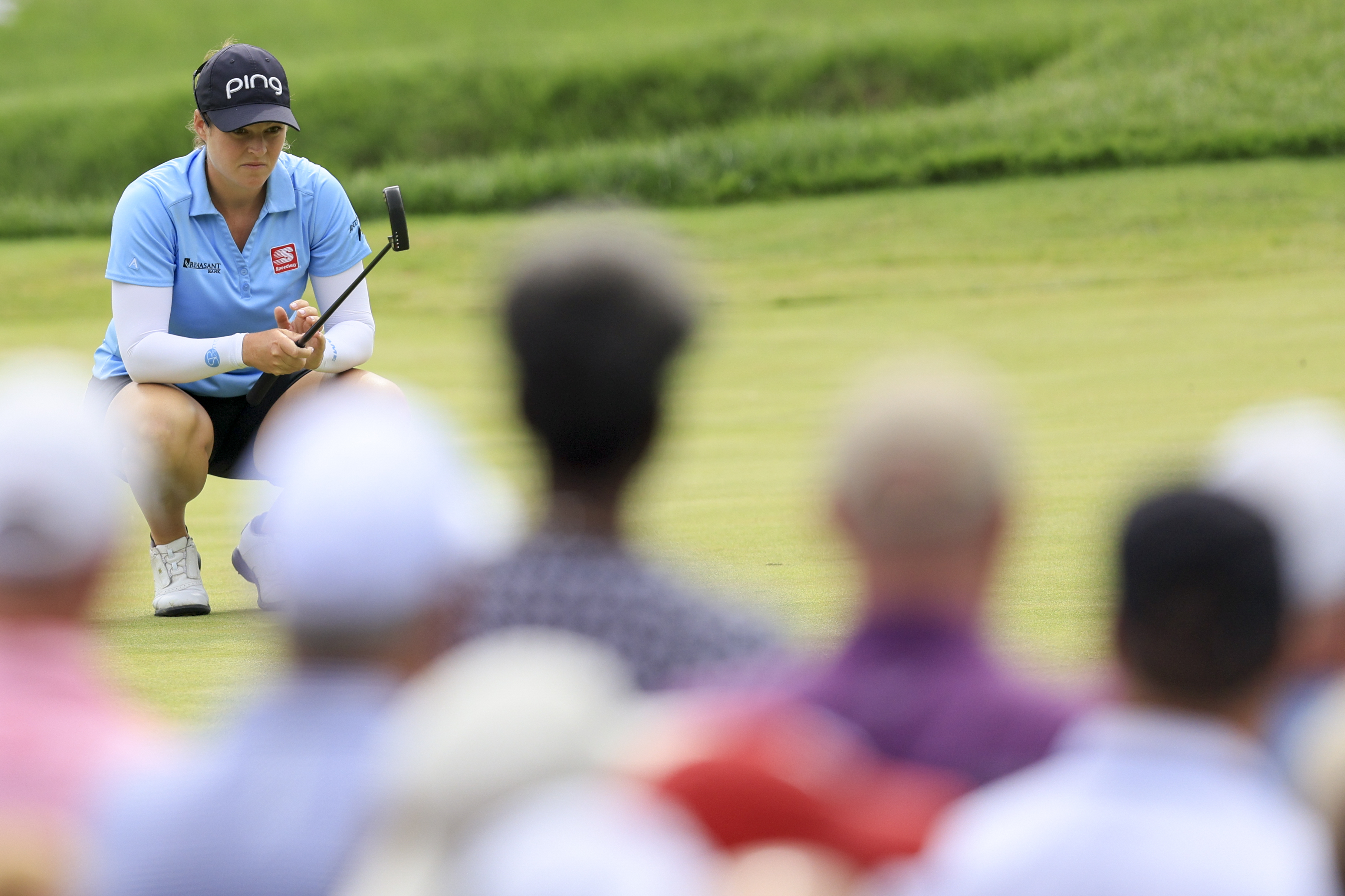Ally Ewing lines up a putt on the 13th green during the third round of the LPGA Tour Kroger Queen City Championship golf tournament in Cincinnati, Saturday, Sept. 10, 2022. 
