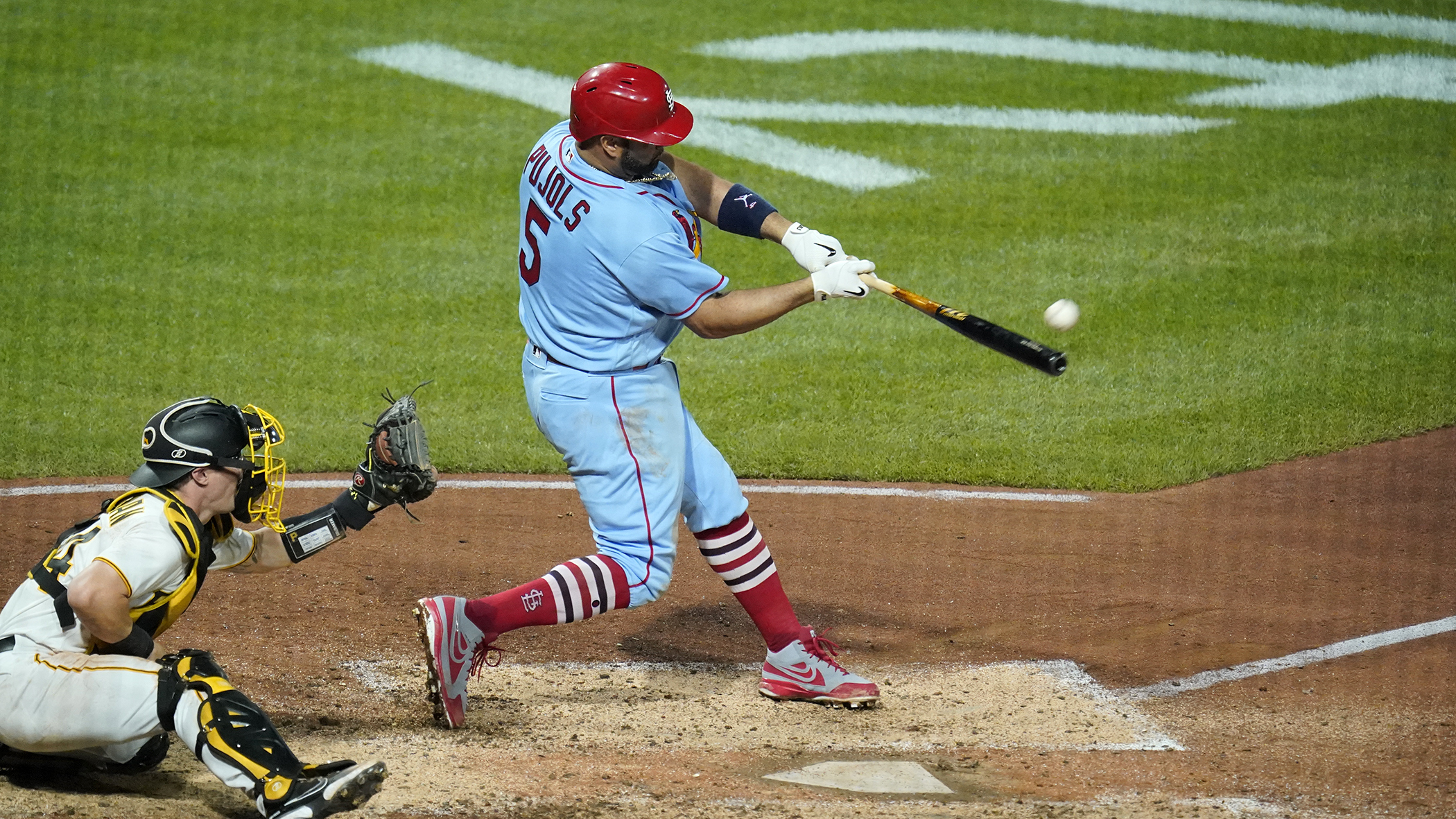 St. Louis Cardinals' Albert Pujols (5) hits a two-run home run off Pittsburgh Pirates starting pitcher JT Brubaker during the sixth inning of a baseball game in Pittsburgh, Saturday, Sept. 10, 2022. 