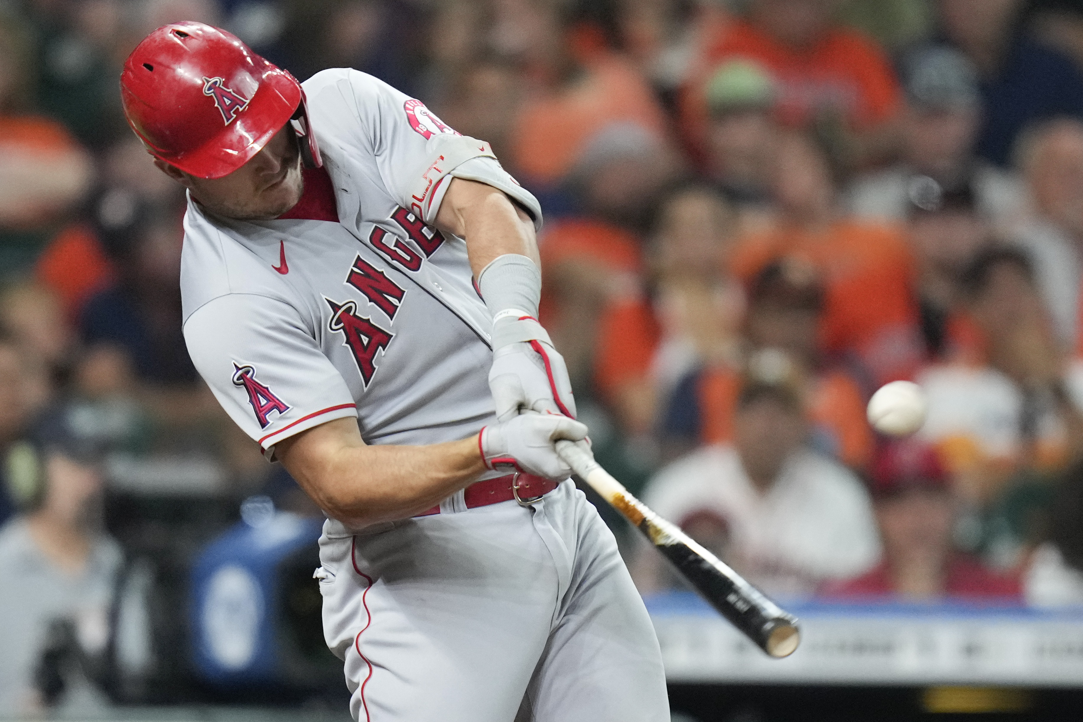 Los Angeles Angels' Mike Trout hits a three-run home run during the second inning of the team's baseball game against the Houston Astros, Saturday, Sept. 10, 2022, in Houston. 
