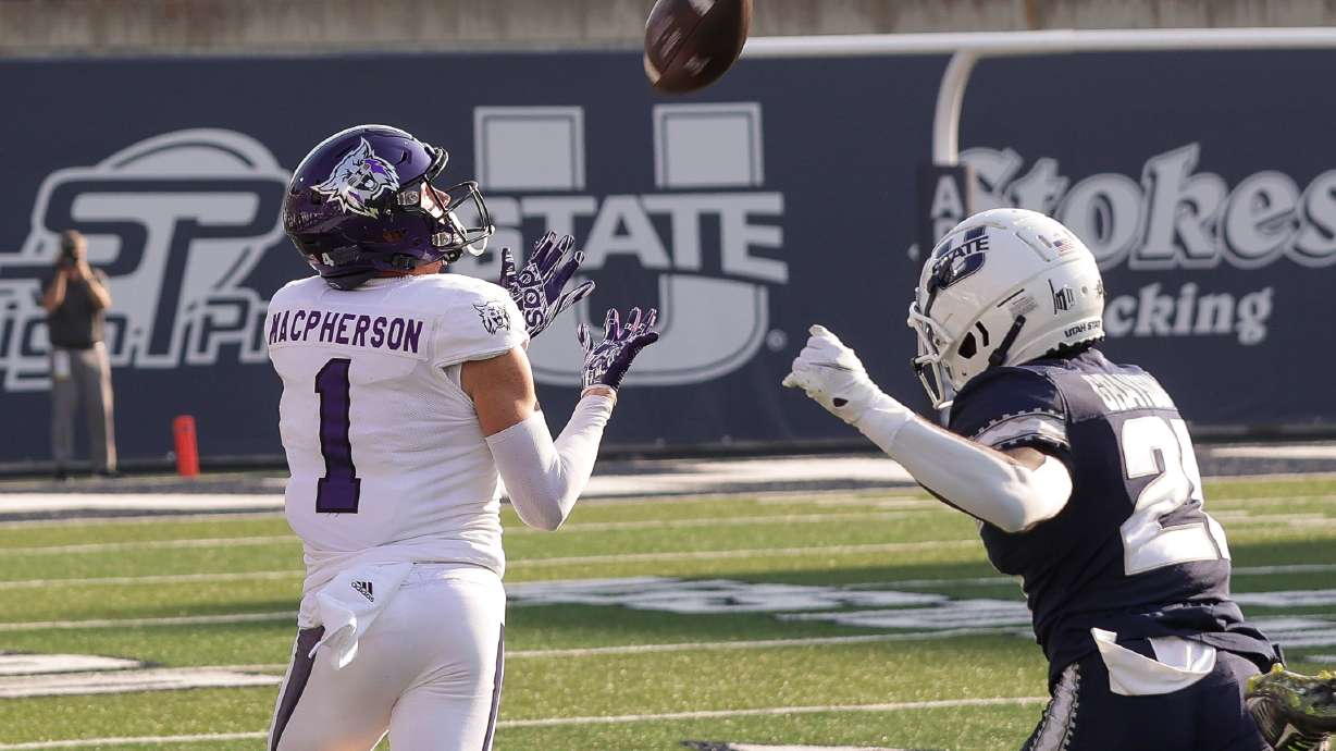 Wide receiver Ty MacPherson catches a pass in a game against Utah State on Sept. 10, 2022.
