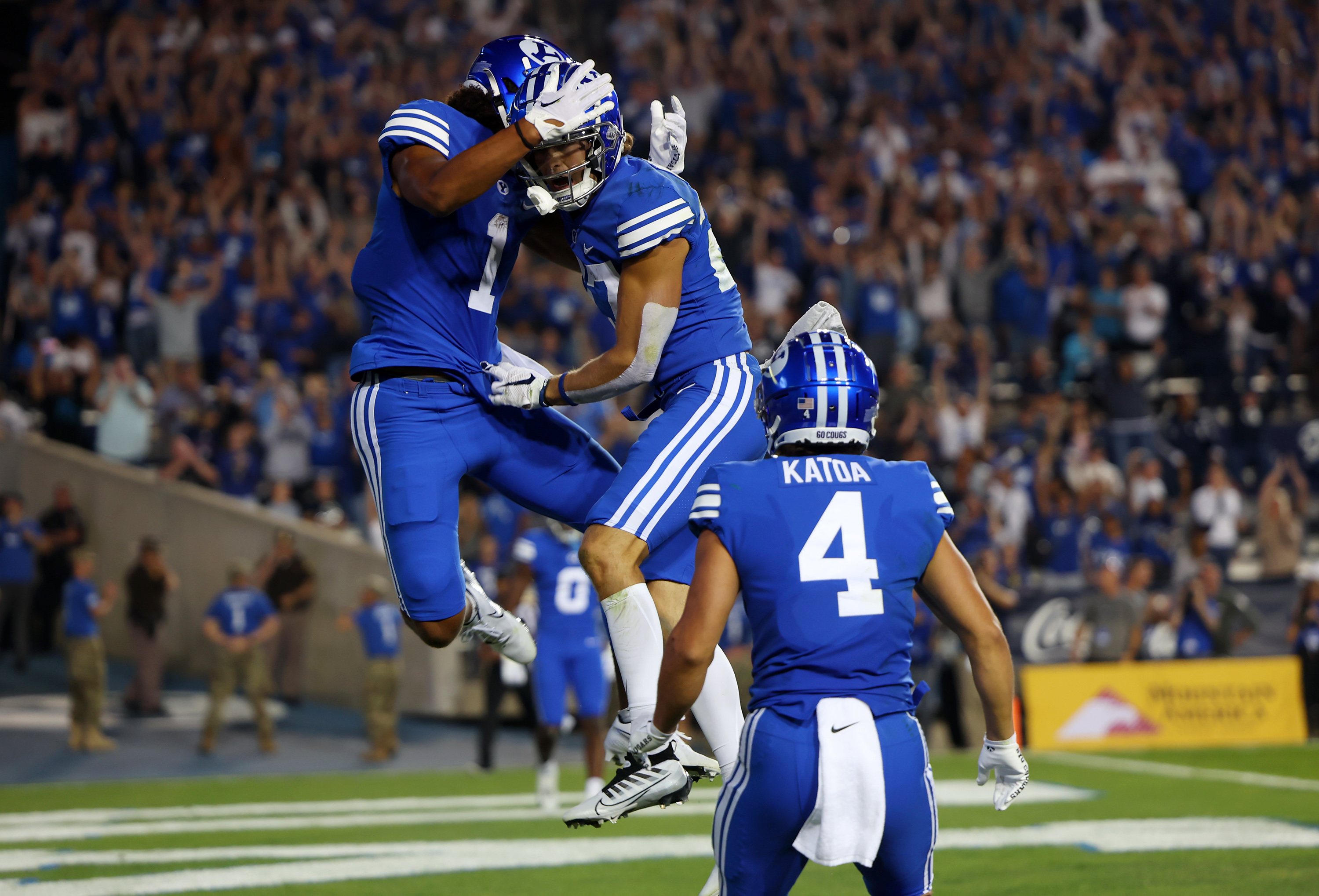 Brigham Young wide receiver Keanu Hill (1) and Brigham Young Cougars wide receiver Chase Roberts (27) jump into the air after Roberts scored a touchdown as BYU and Baylor play at LaVell Edwards Stadium in Provo on Saturday, Sept. 10, 2022.