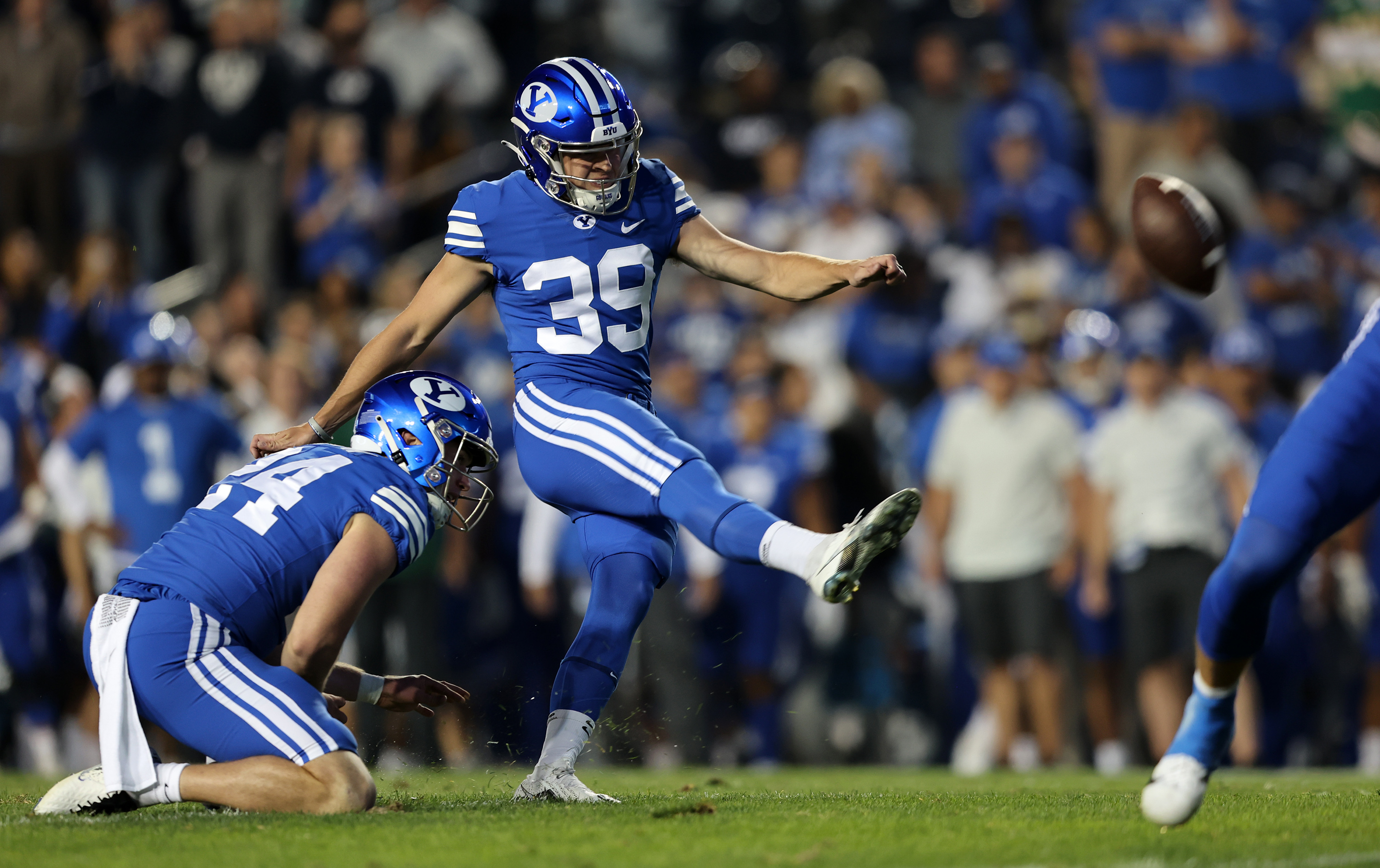 Brigham Young Cougars place kicker Jake Oldroyd (39) kicks an extra point as BYU and Baylor play at LaVell Edwards Stadium in Provo on Saturday, Sept. 10, 2022.