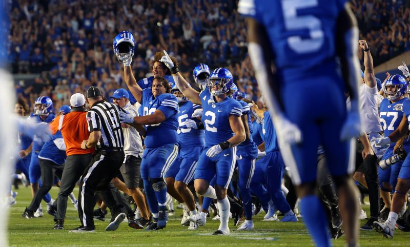 BYU rush the field after defeating Baylor in overtime 26-20 at LaVell Edwards Stadium in Provo on Sunday, Sept. 11, 2022. - Scott G Winterton, Deseret News