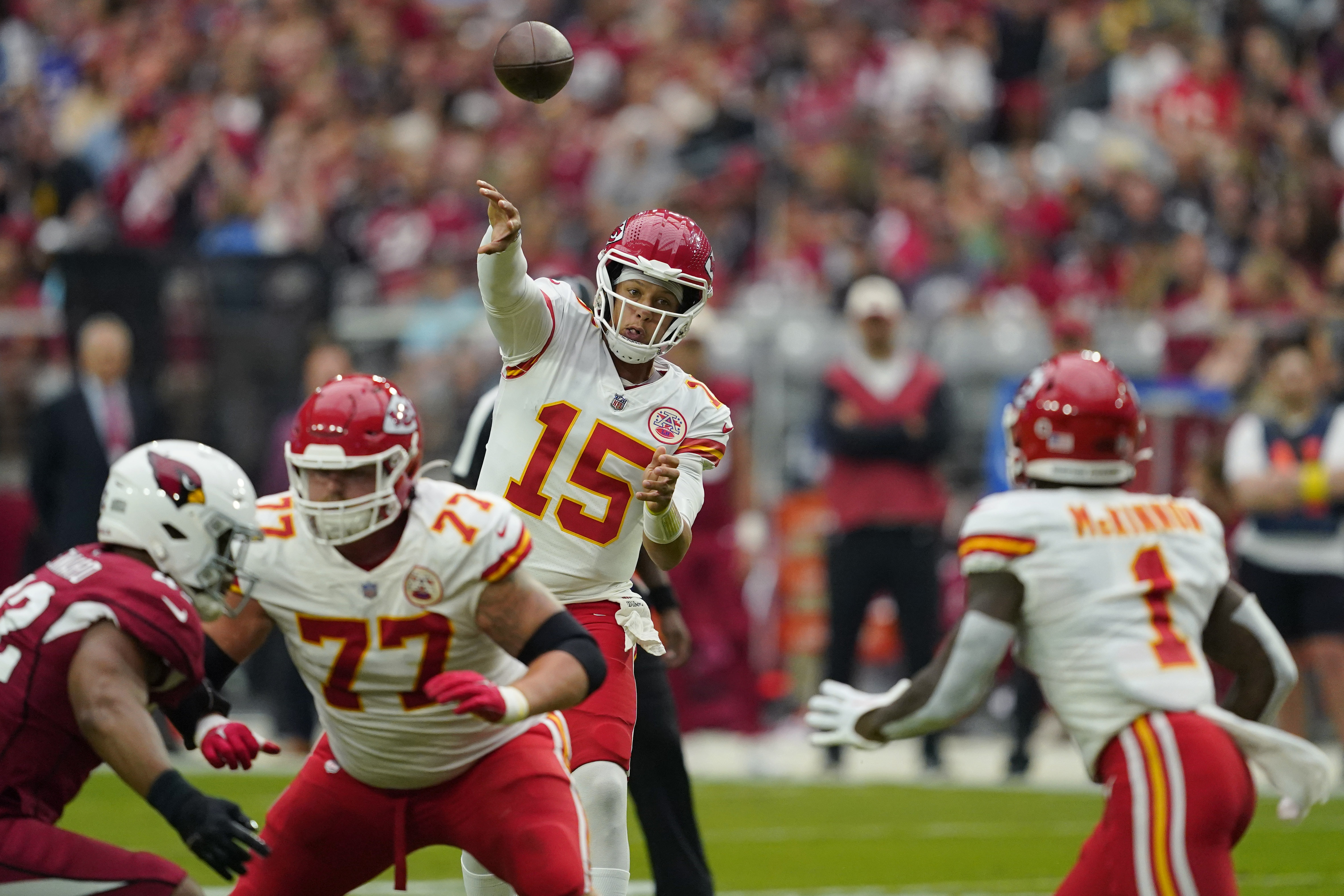Kansas City Chiefs quarterback Patrick Mahomes (15) throws against the Arizona Cardinals during the first half of an NFL football game, Sunday, Sept. 11, 2022, in Glendale, Ariz.